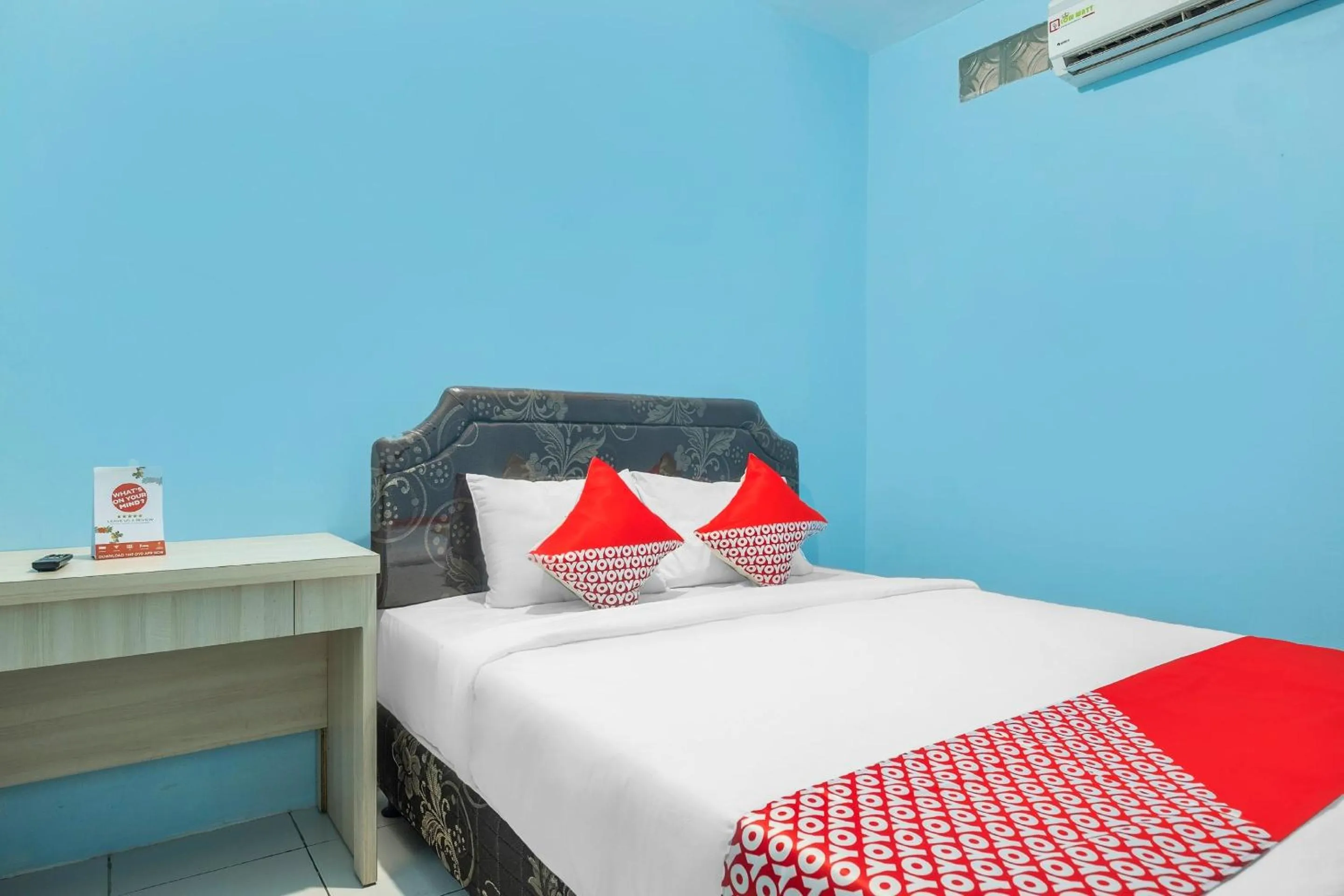 Bedroom in Hotel O RF Homestay