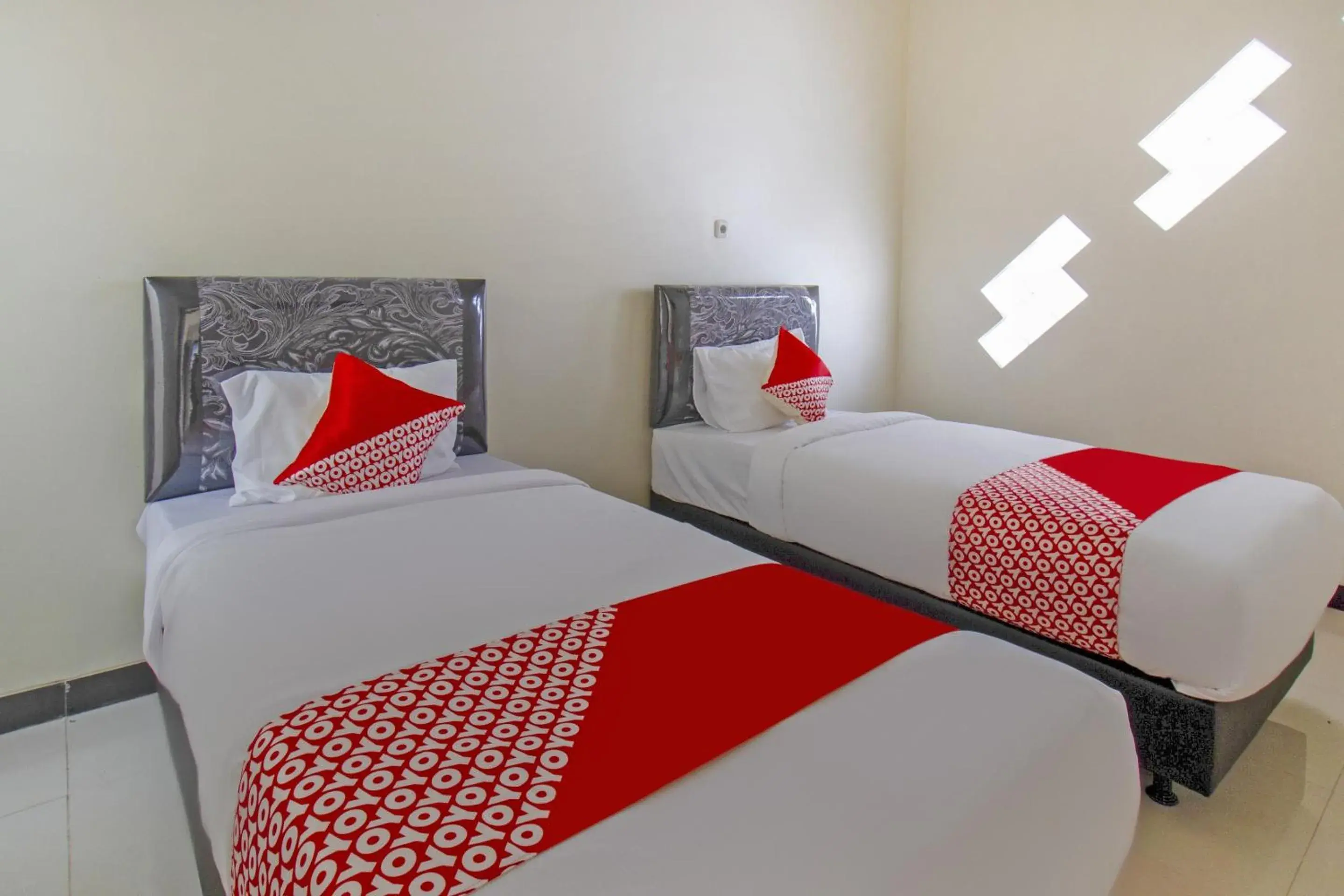 Delxue Twin Room in Hotel O Irma's Residence Delxue Twin Room in Hotel O Irma's Residence