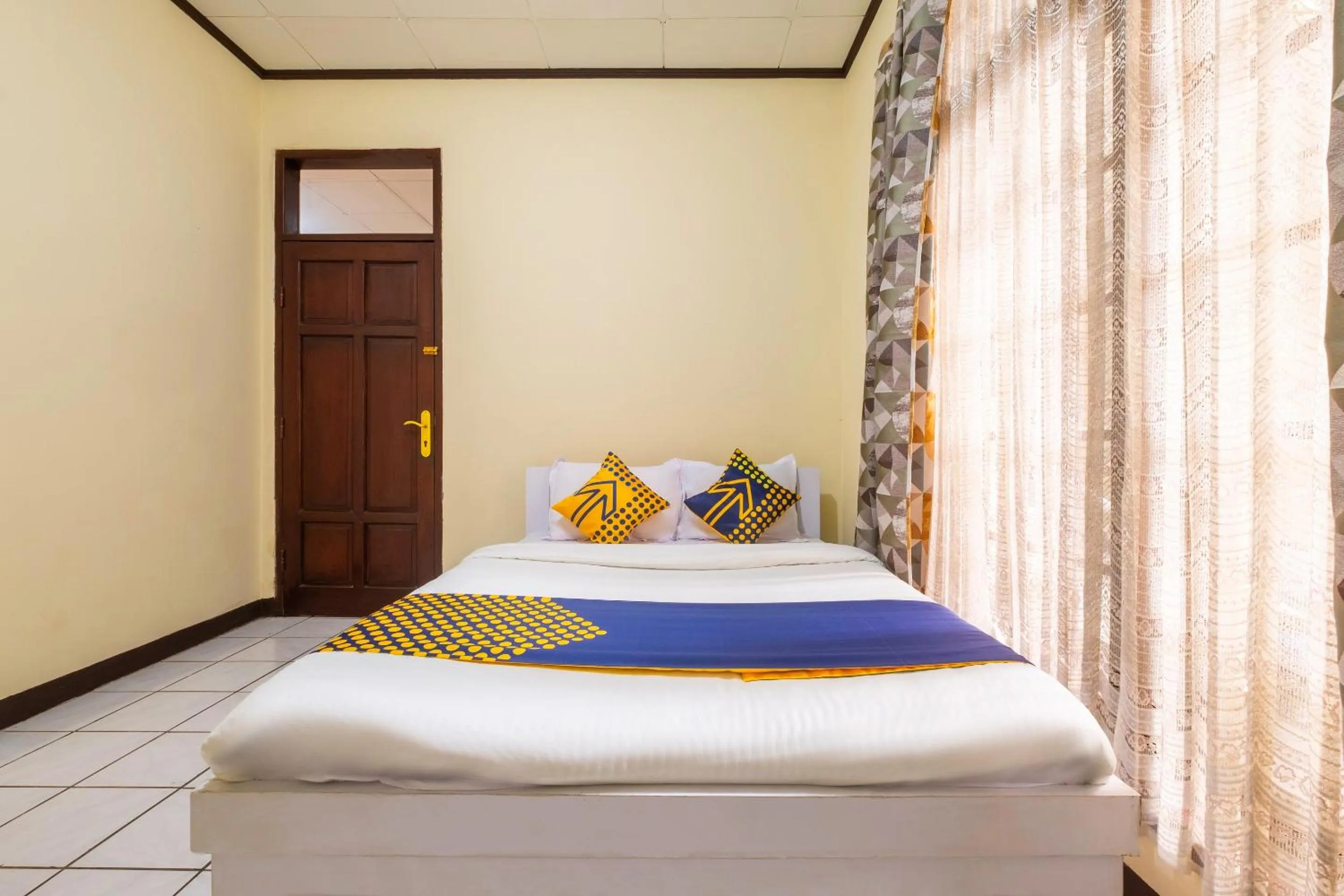 Bedroom in Super OYO 2672 Bee M Syariah