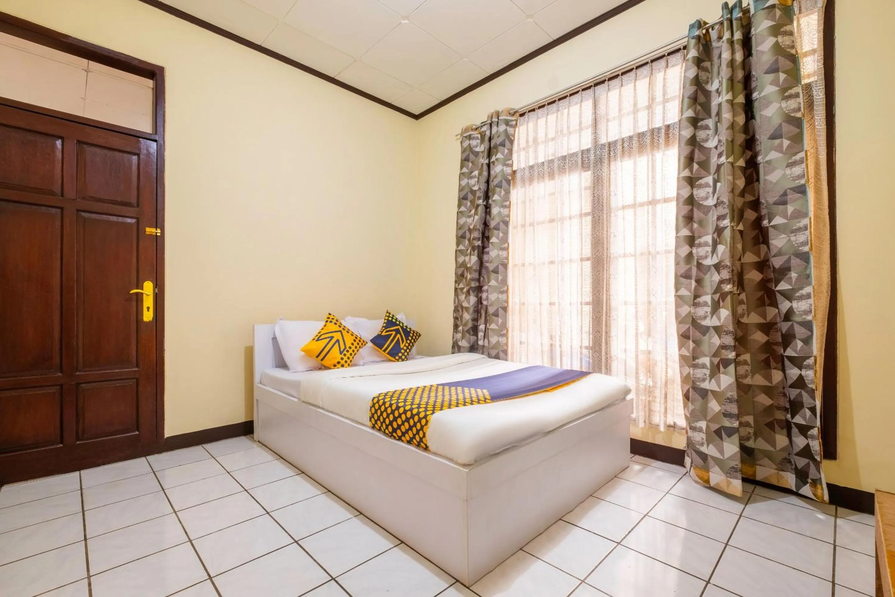 Bedroom in Super OYO 2672 Bee M Syariah