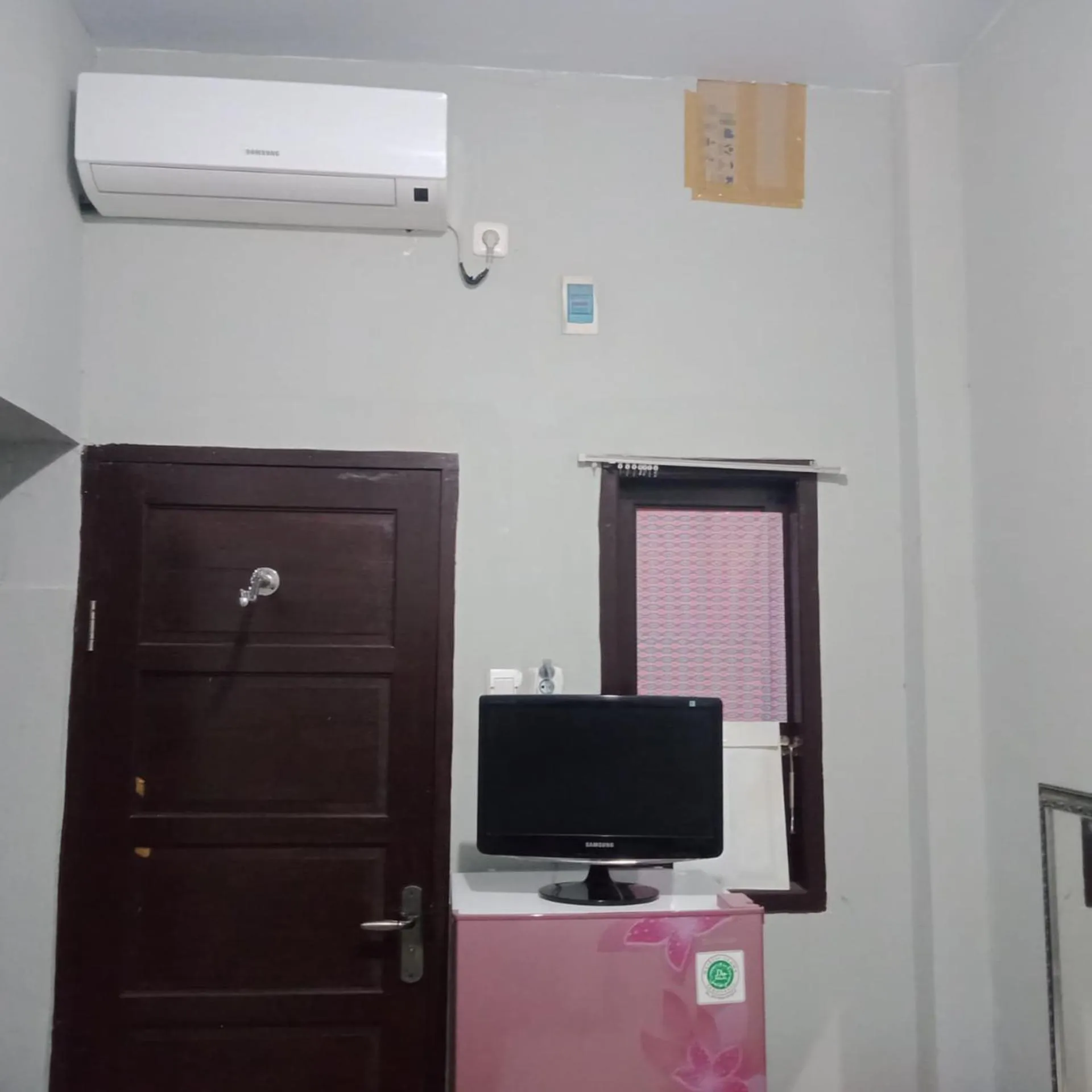 TV and multimedia in Hotel O Pondok Orange Family