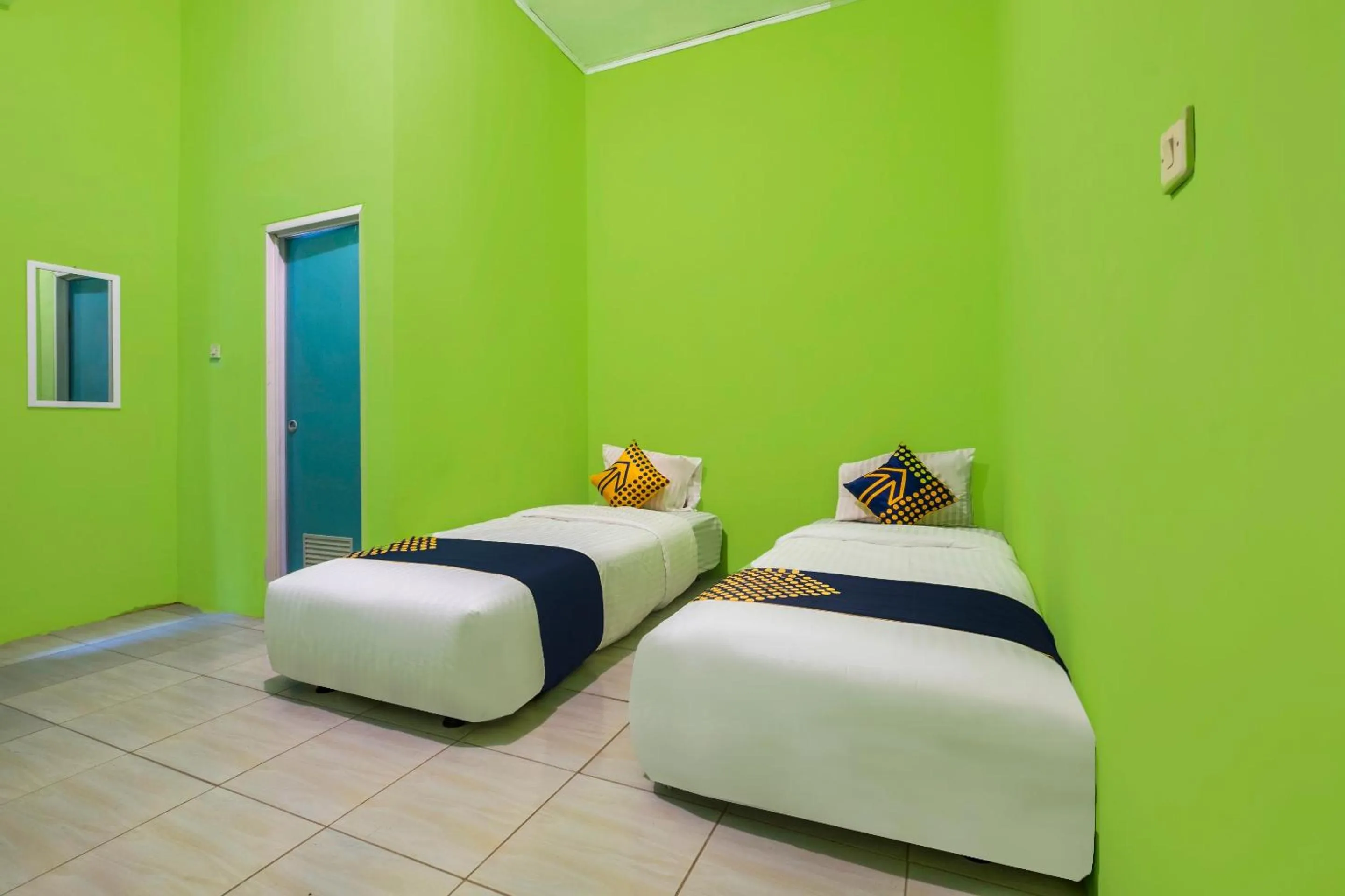 Bedroom in OYO 2859 Fatan Costel Syariah