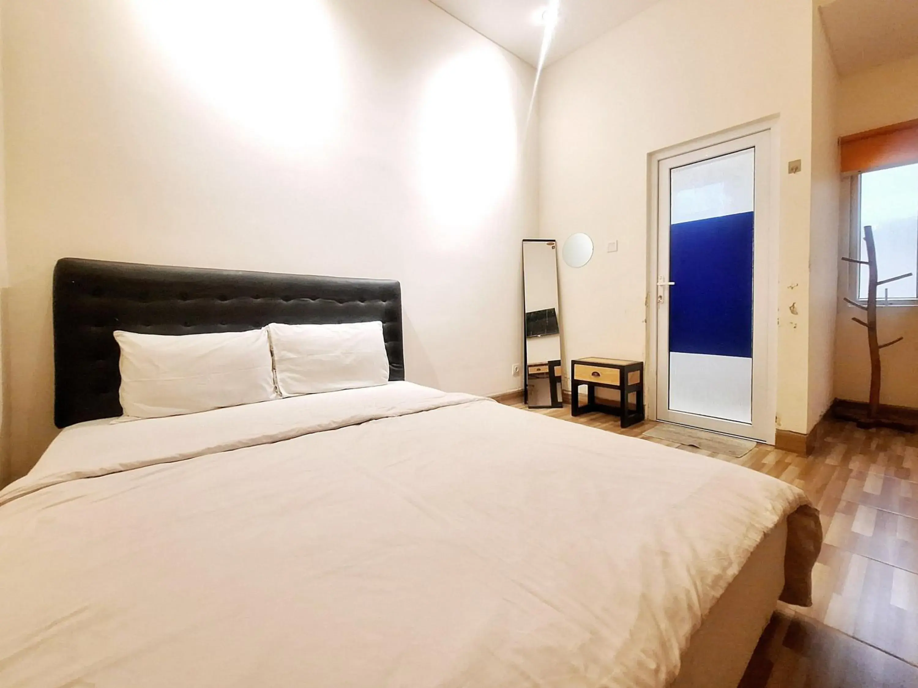 Deluxe Double Room in Sari Panguripan RedPartner Near UGM Deluxe Double Room in Sari Panguripan RedPartner Near UGM