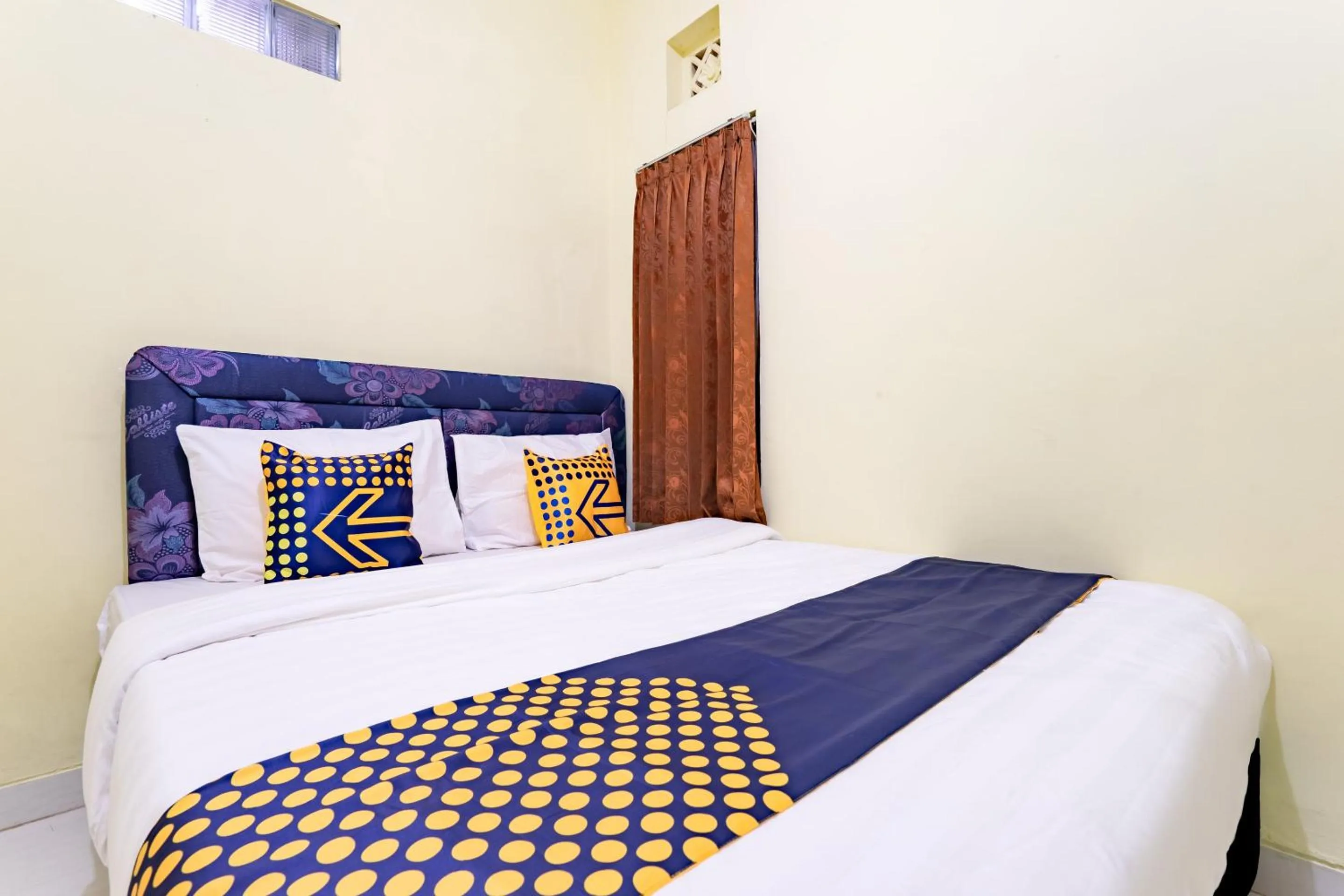 Bedroom in Hotel O Nabila Homestay