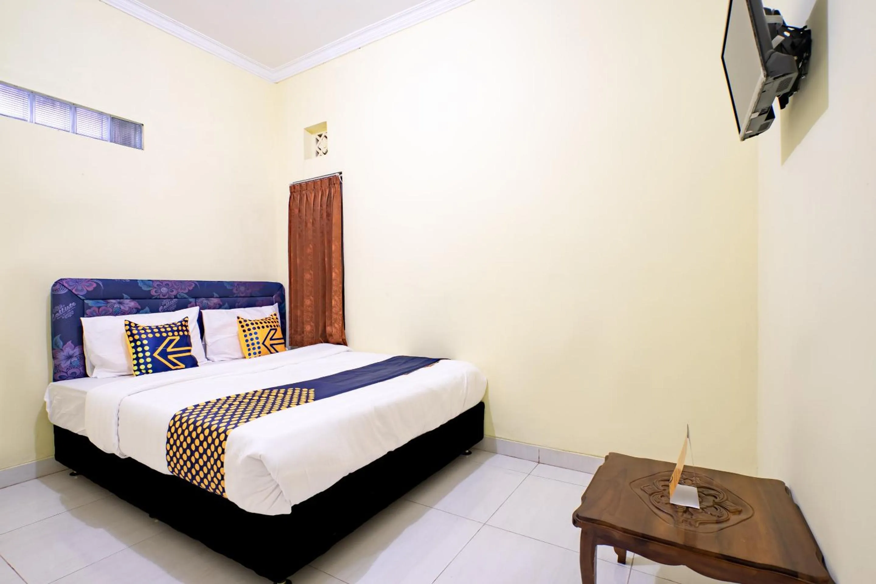 Bedroom in Hotel O Nabila Homestay