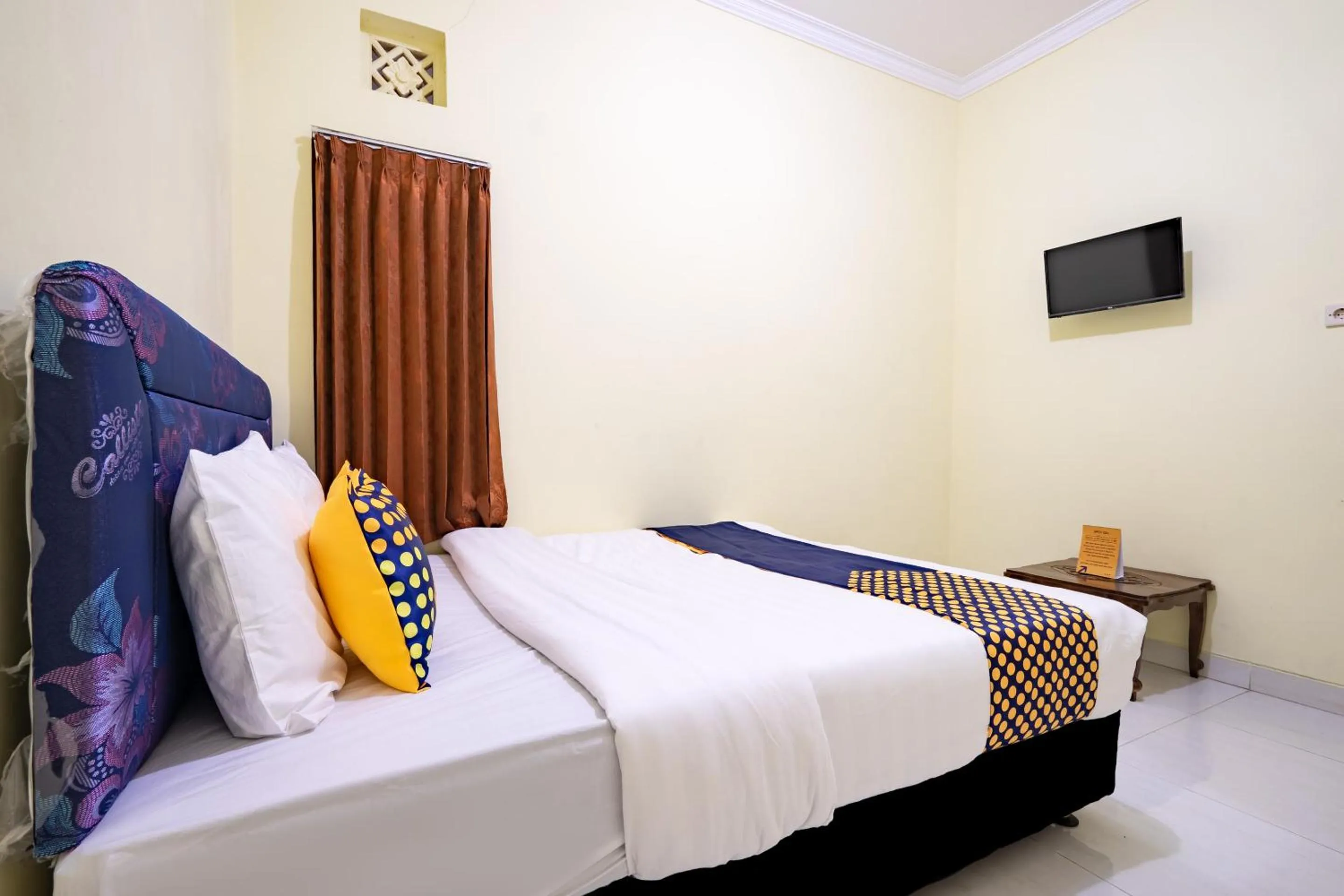 Bedroom in Hotel O Nabila Homestay