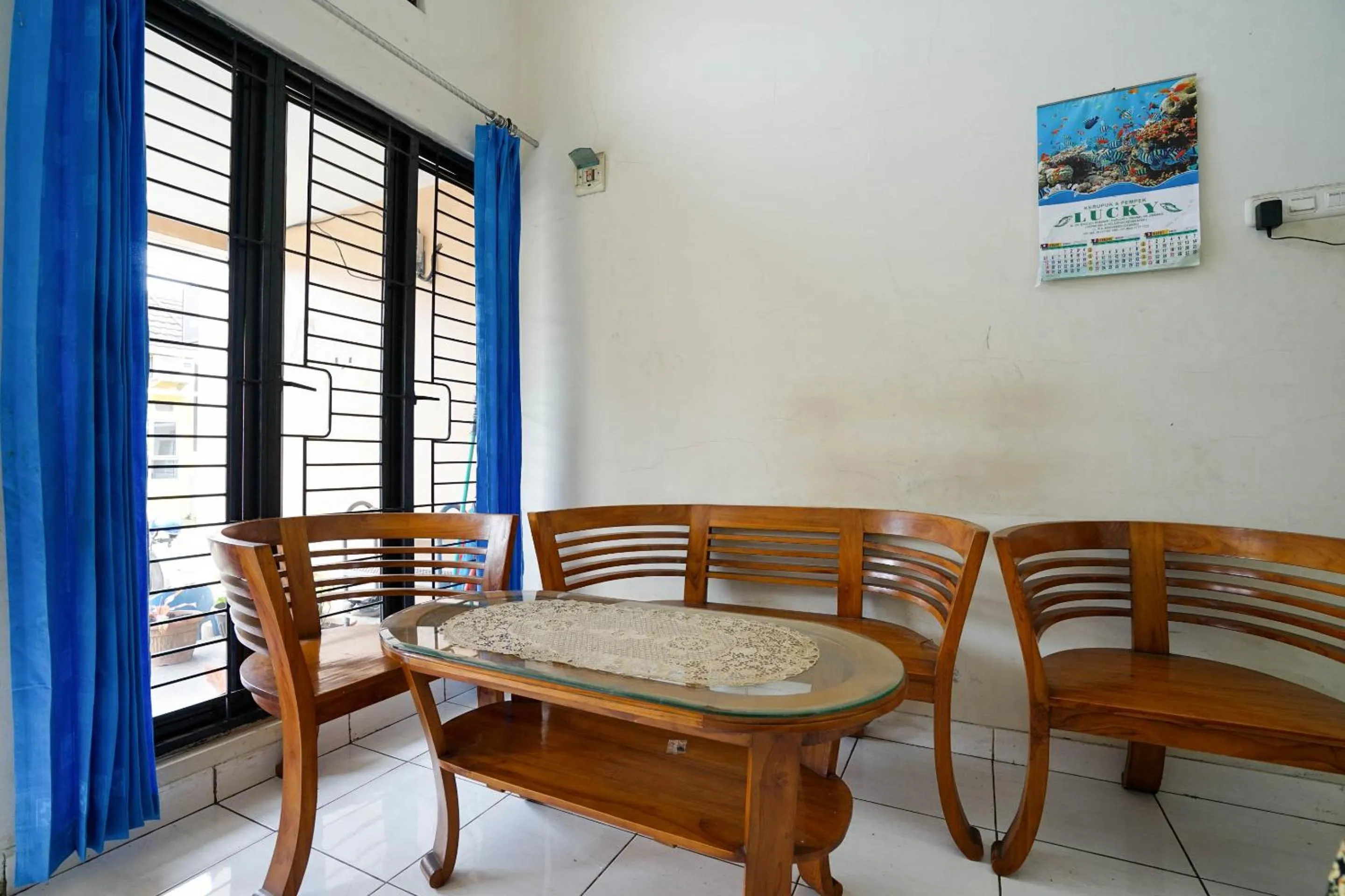 Lobby or reception in OYO Life 2874 Berlian Residence