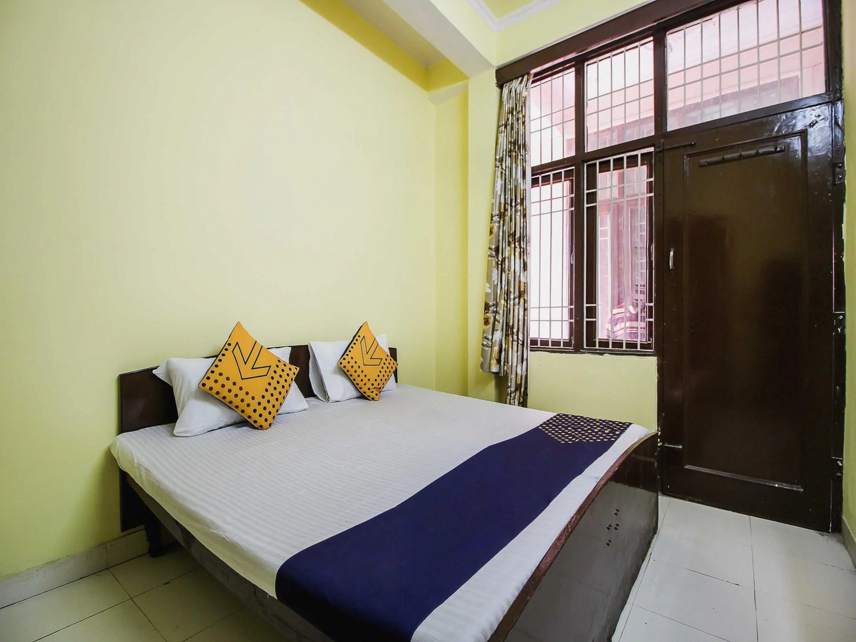 Bedroom in Collection O Hotel Kavya Guest House