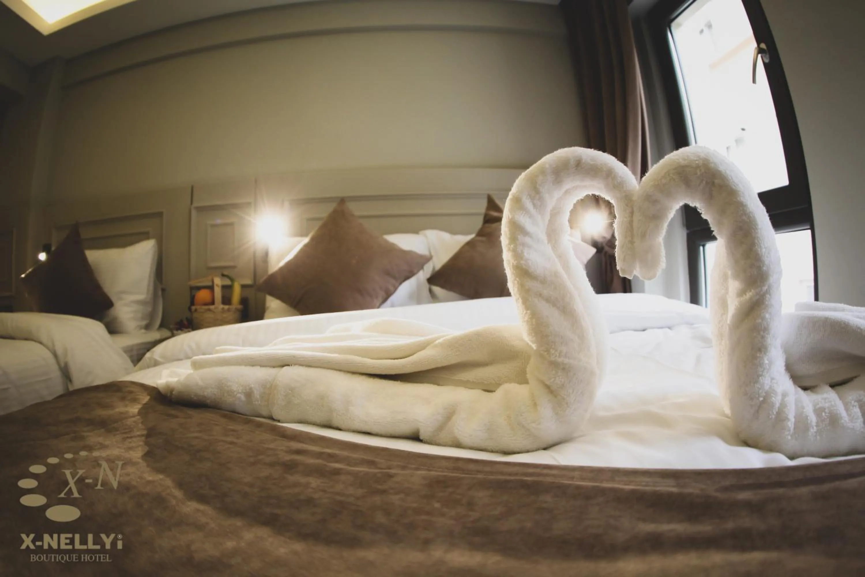 Bed in X-NELLYİ HOTEL