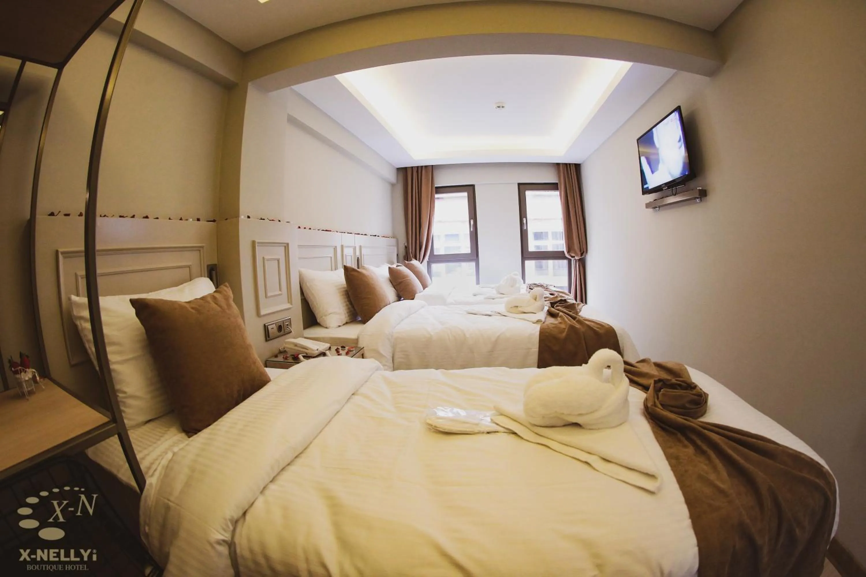 Bed in X-NELLYİ HOTEL