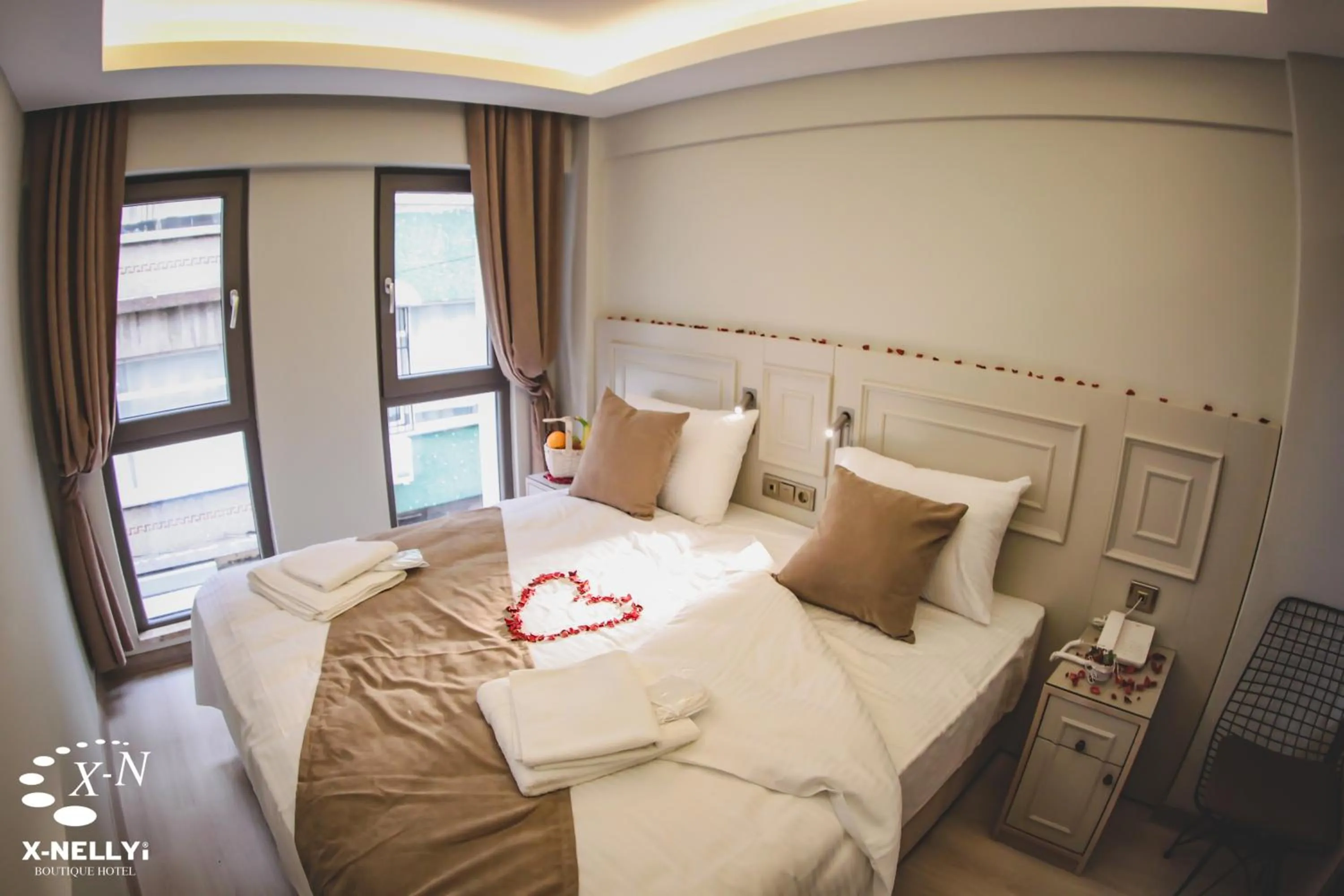 Bed in X-NELLYİ HOTEL