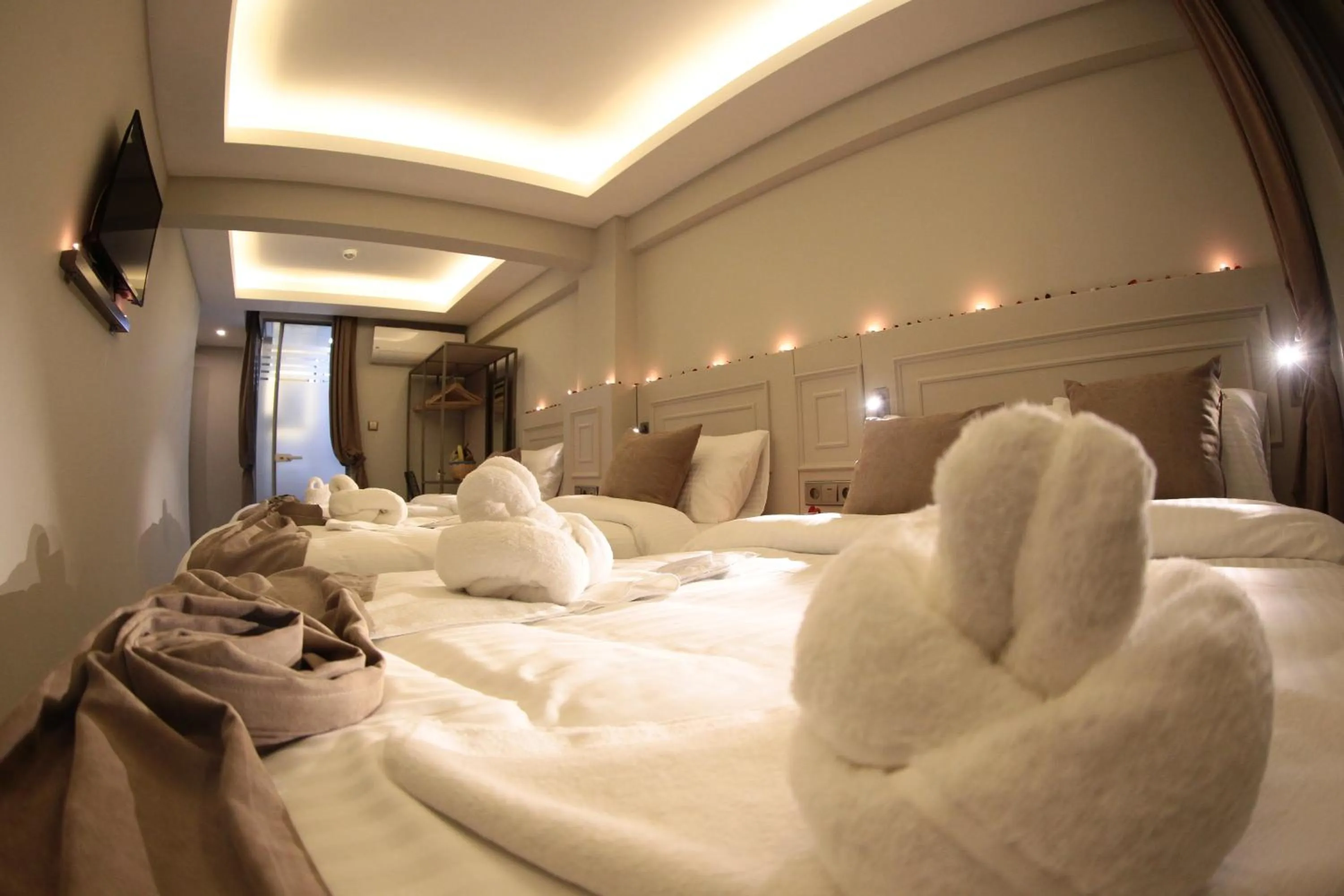 Bed in X-NELLYİ HOTEL