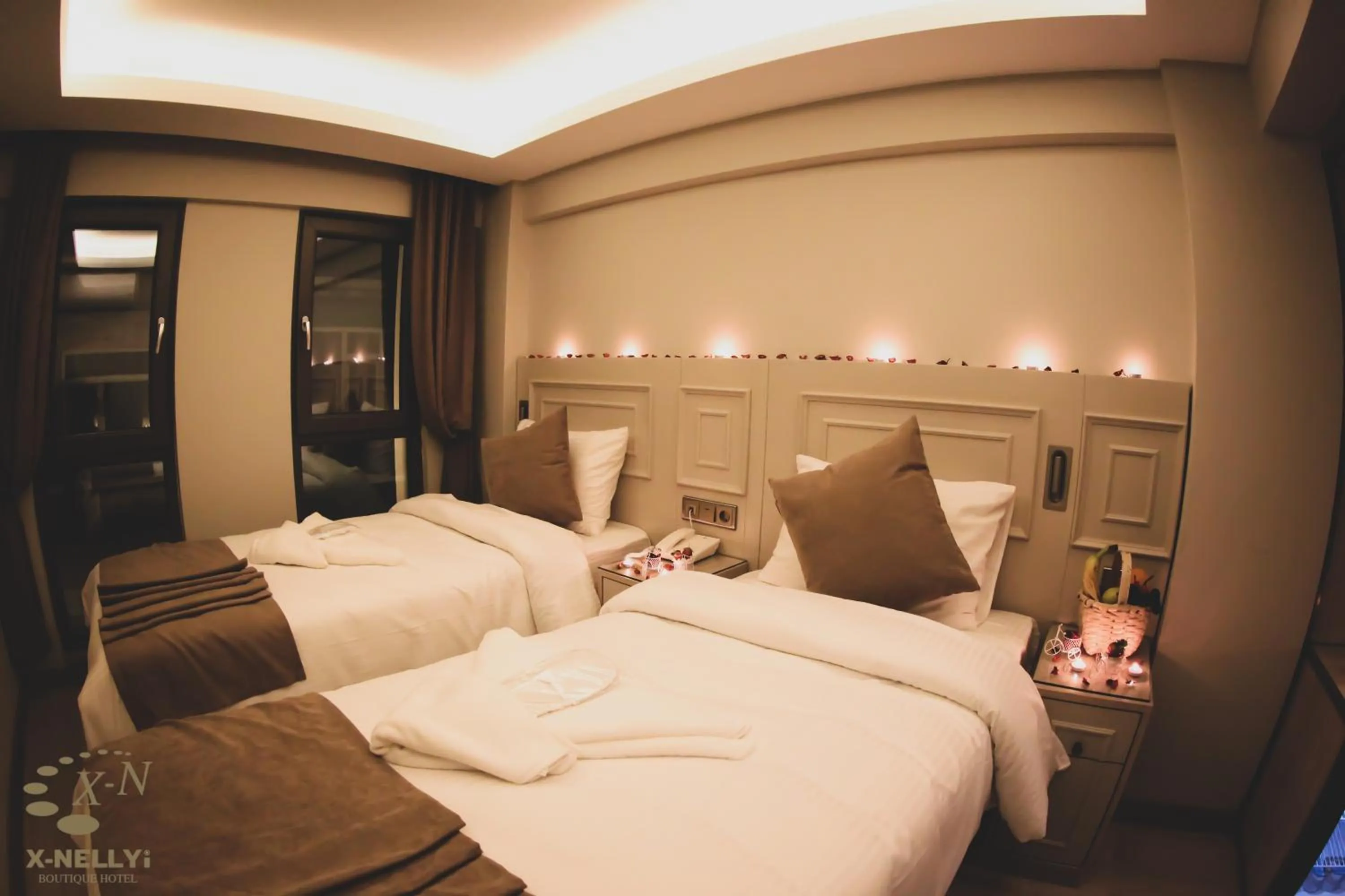 Bed in X-NELLYİ HOTEL