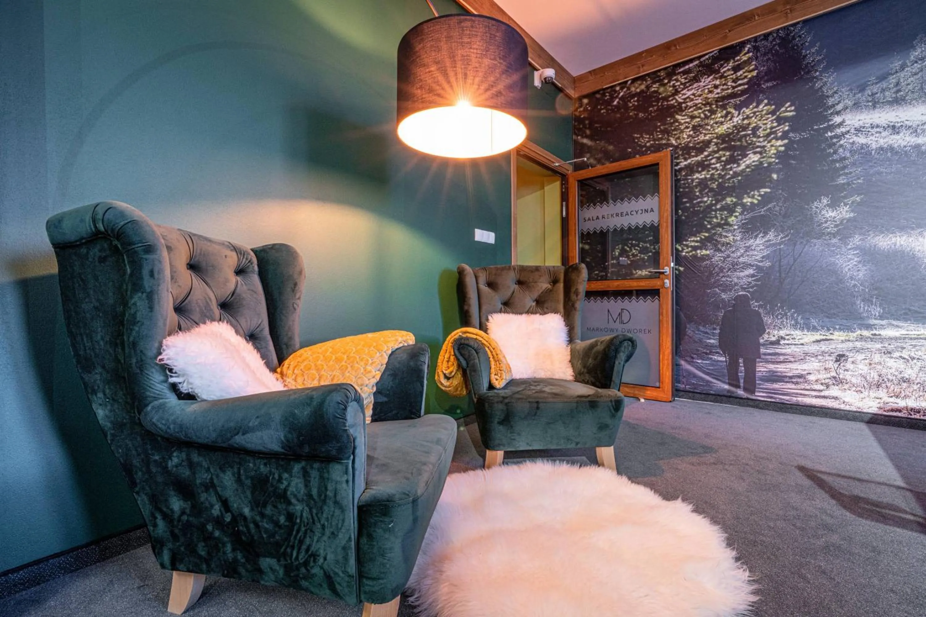 Seating area, Bed in Rezydencja Markowy Dworek