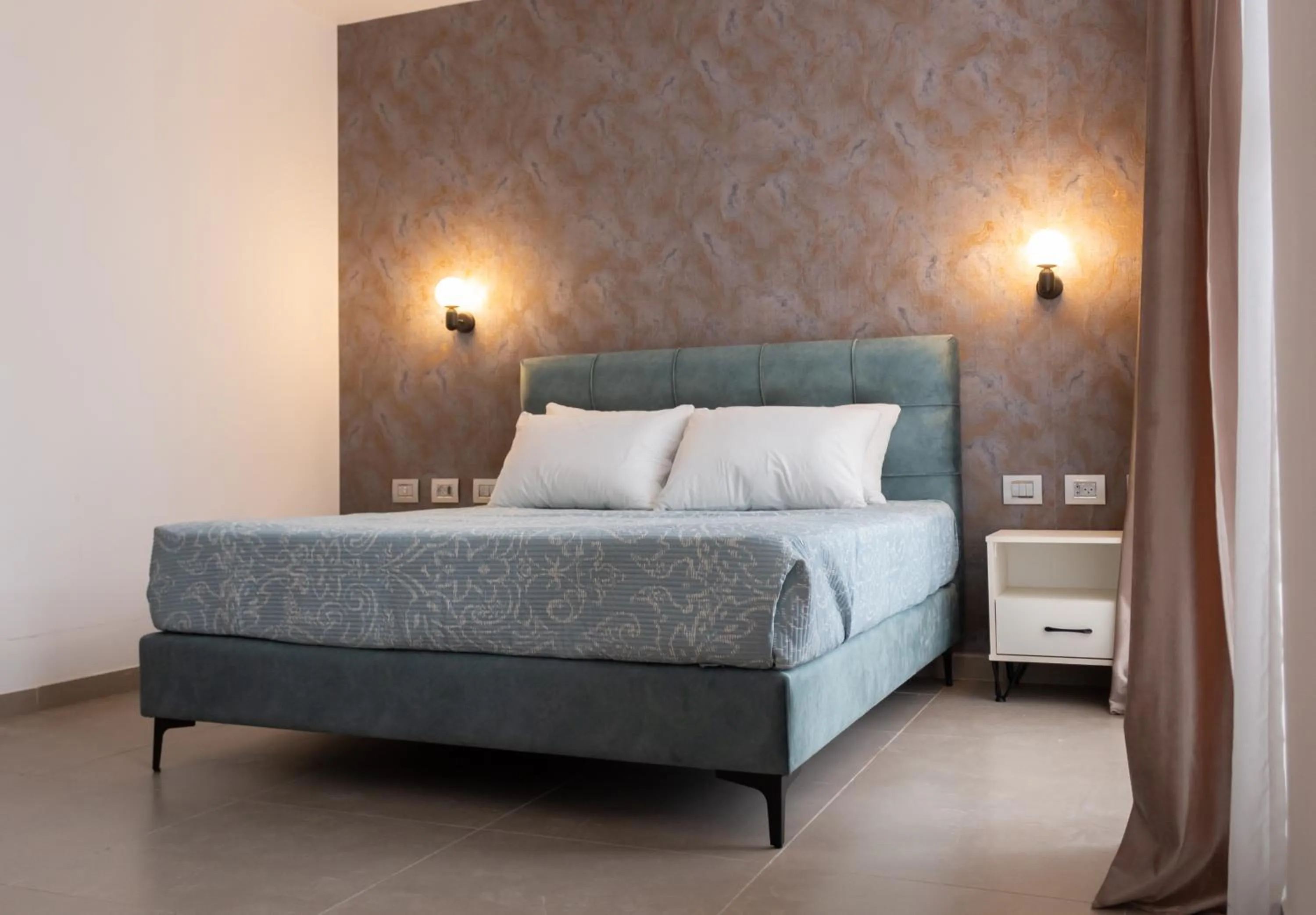 Bed in Amwaj Apartments