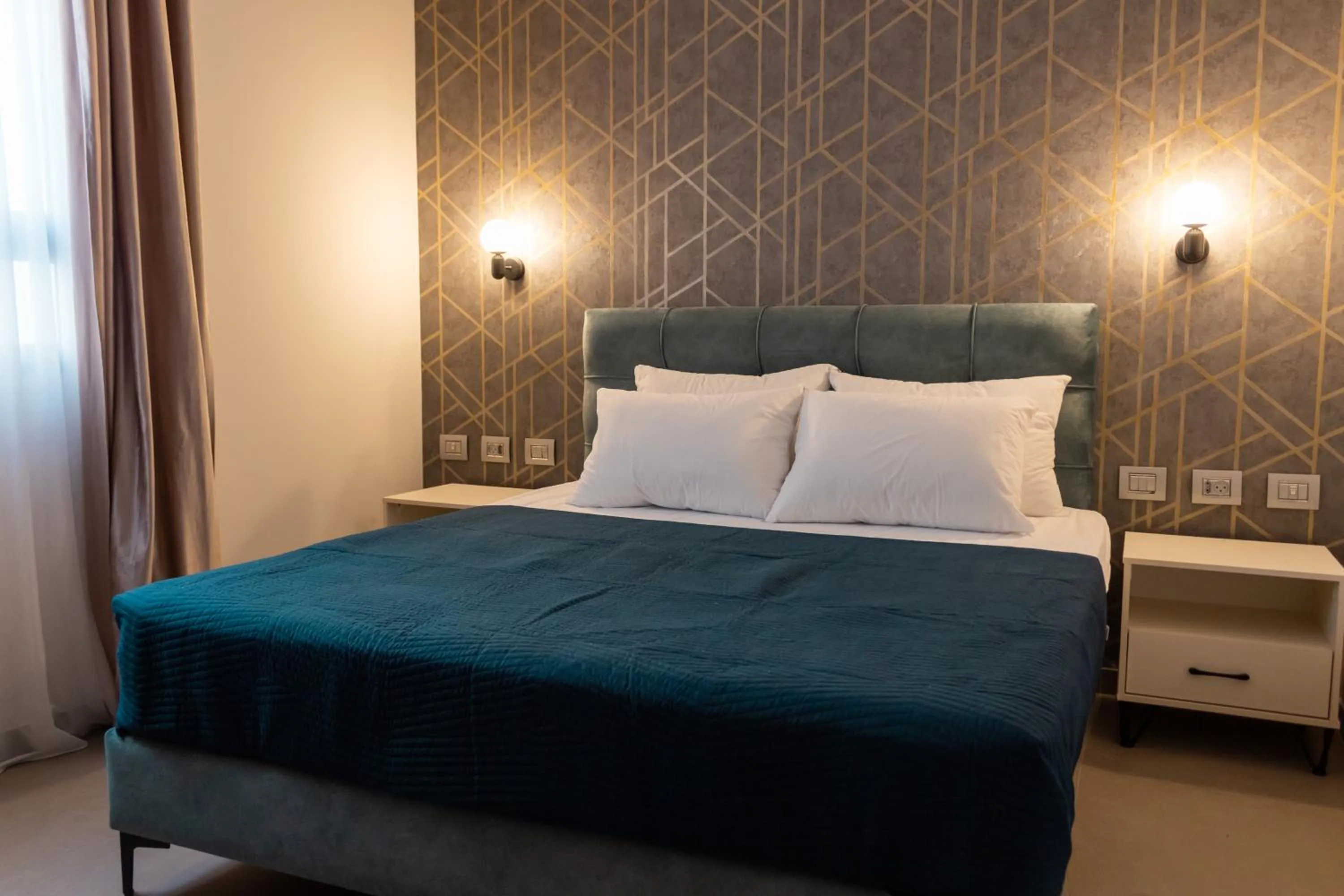 Bed in Amwaj Apartments
