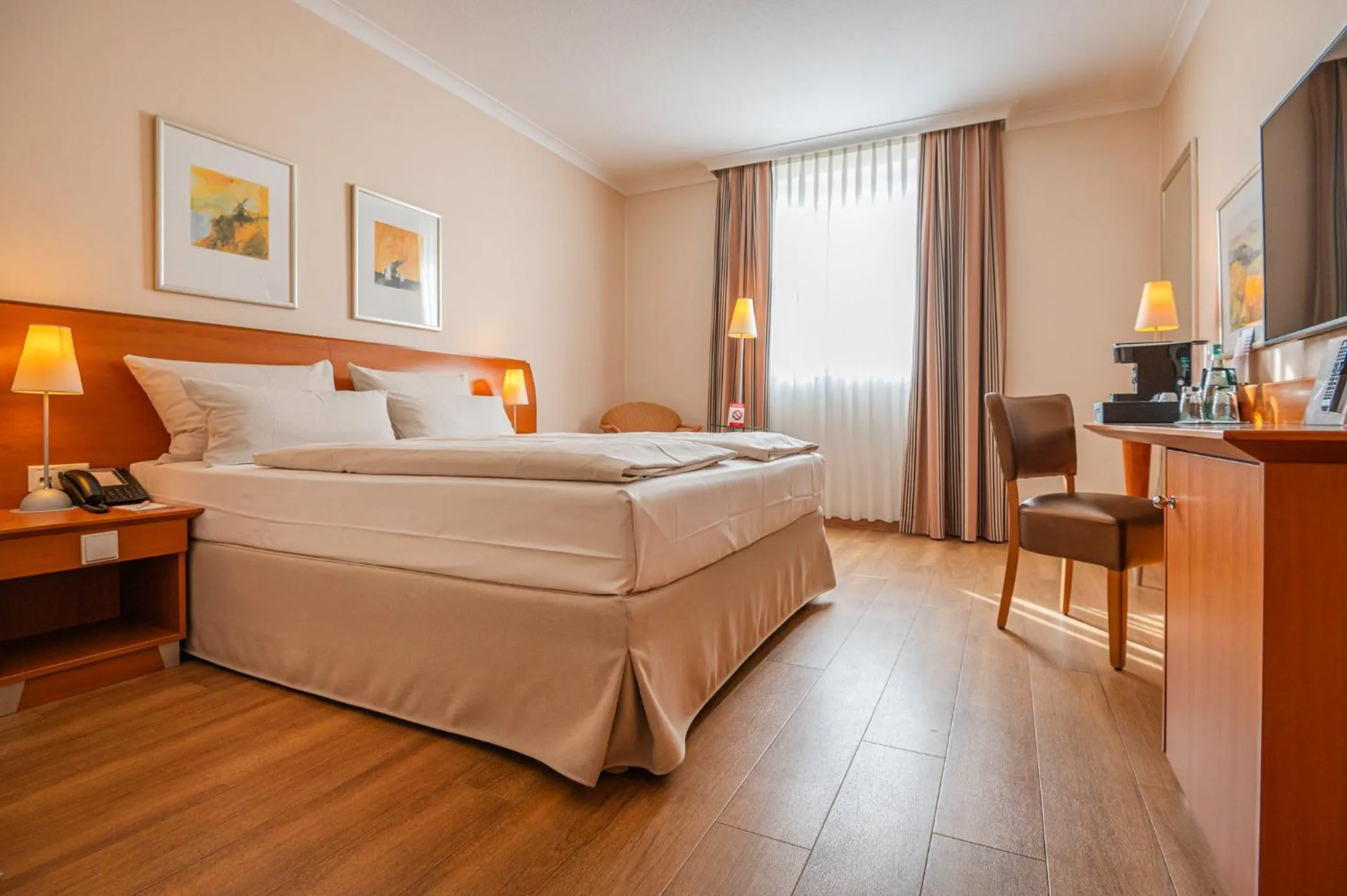 Photo of the whole room, Bed in PhiLeRo Hotel Köln