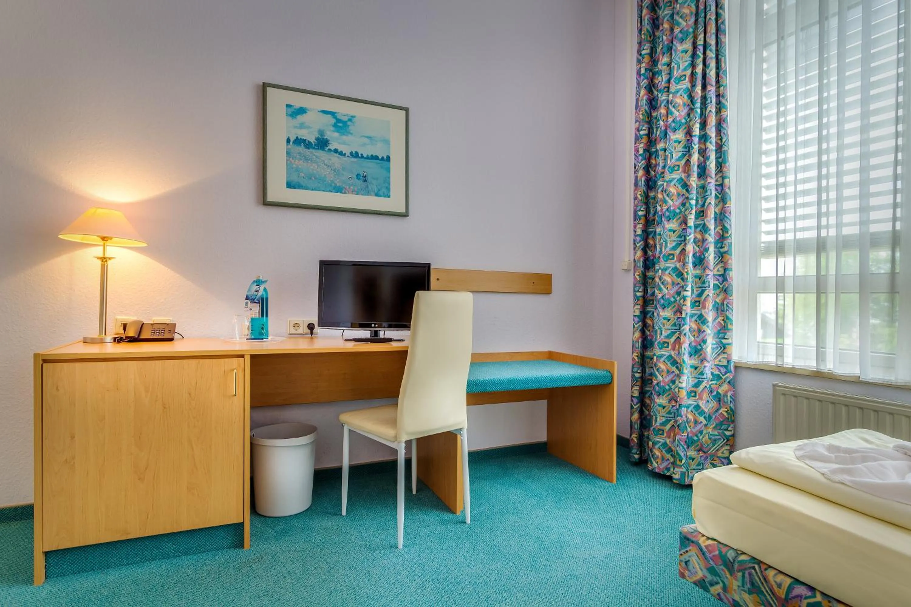 Photo of the whole room, Bed in Hotel Alte Klavierfabrik Meißen