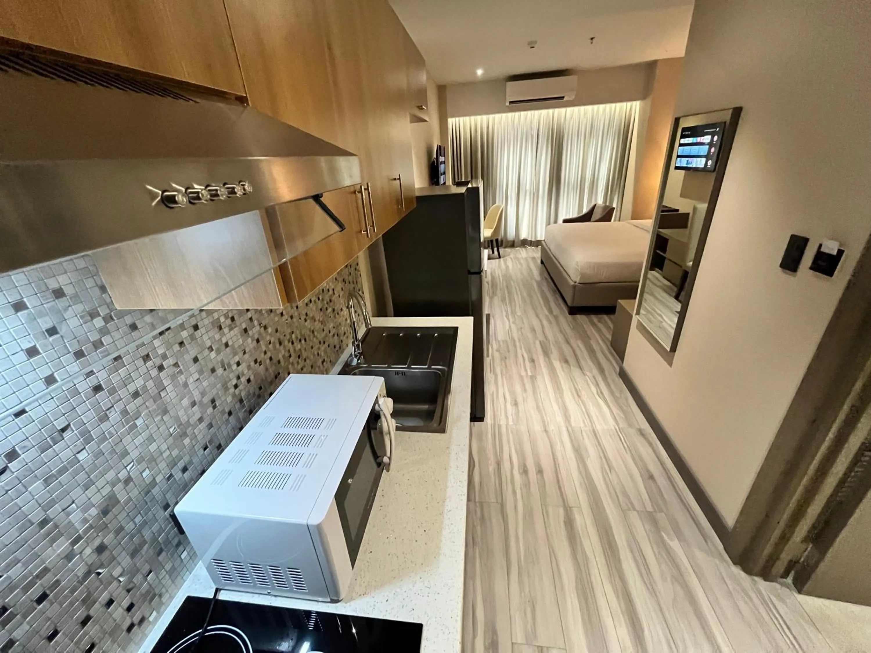 Living room, Bed in Capitol Hill Hotel and Suites