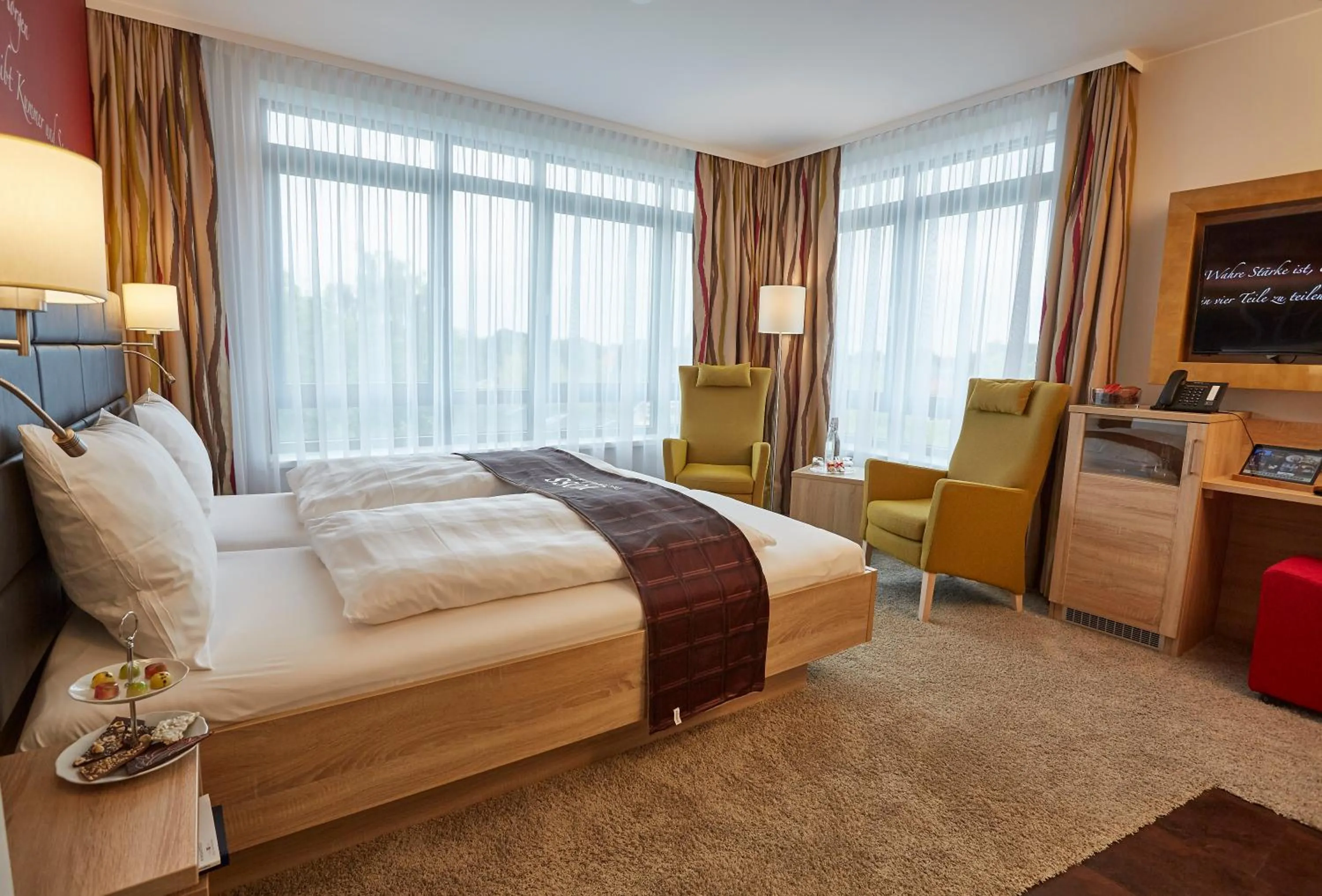 Photo of the whole room, Bed in Das Schokoladenhotel