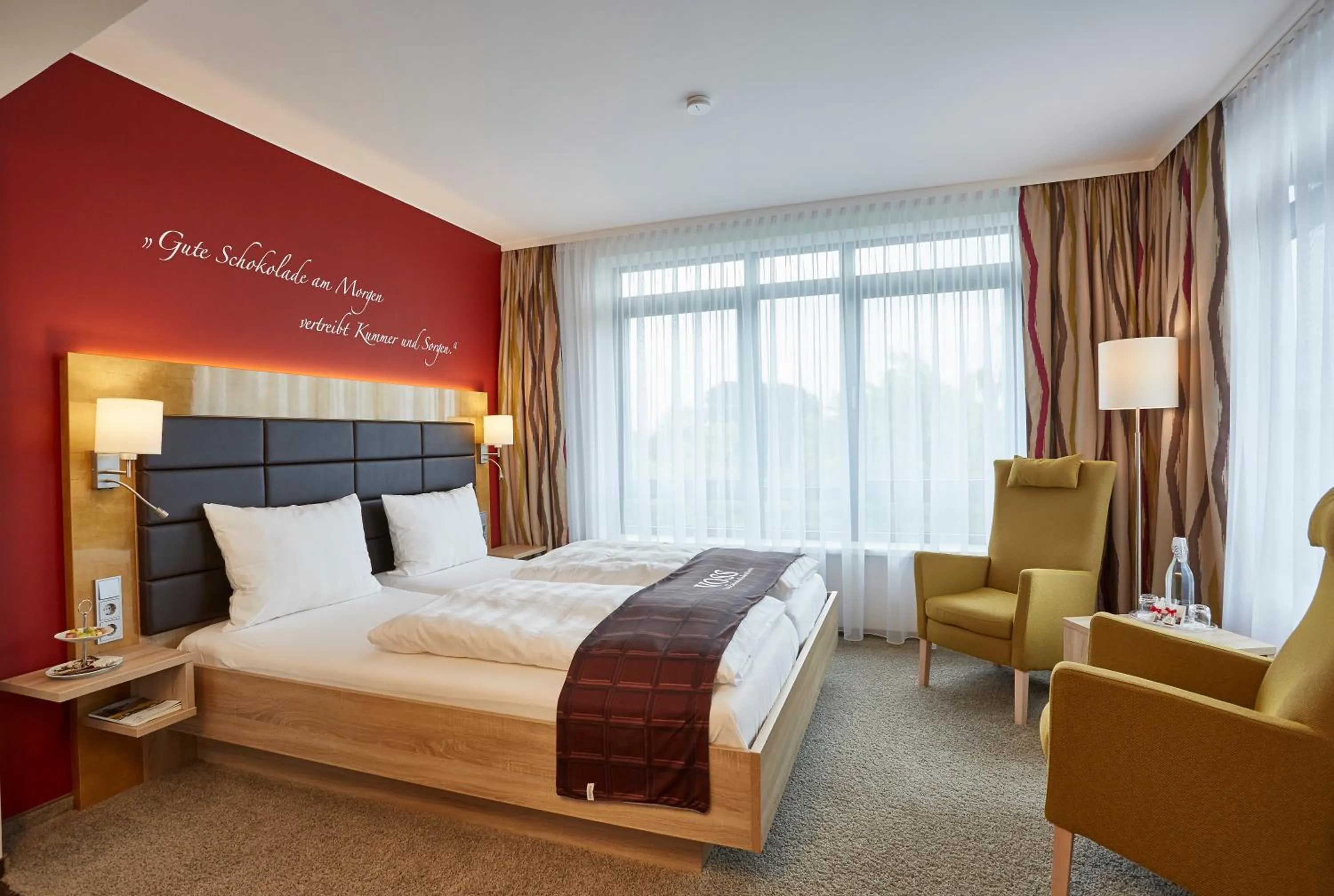 Photo of the whole room, Bed in Das Schokoladenhotel