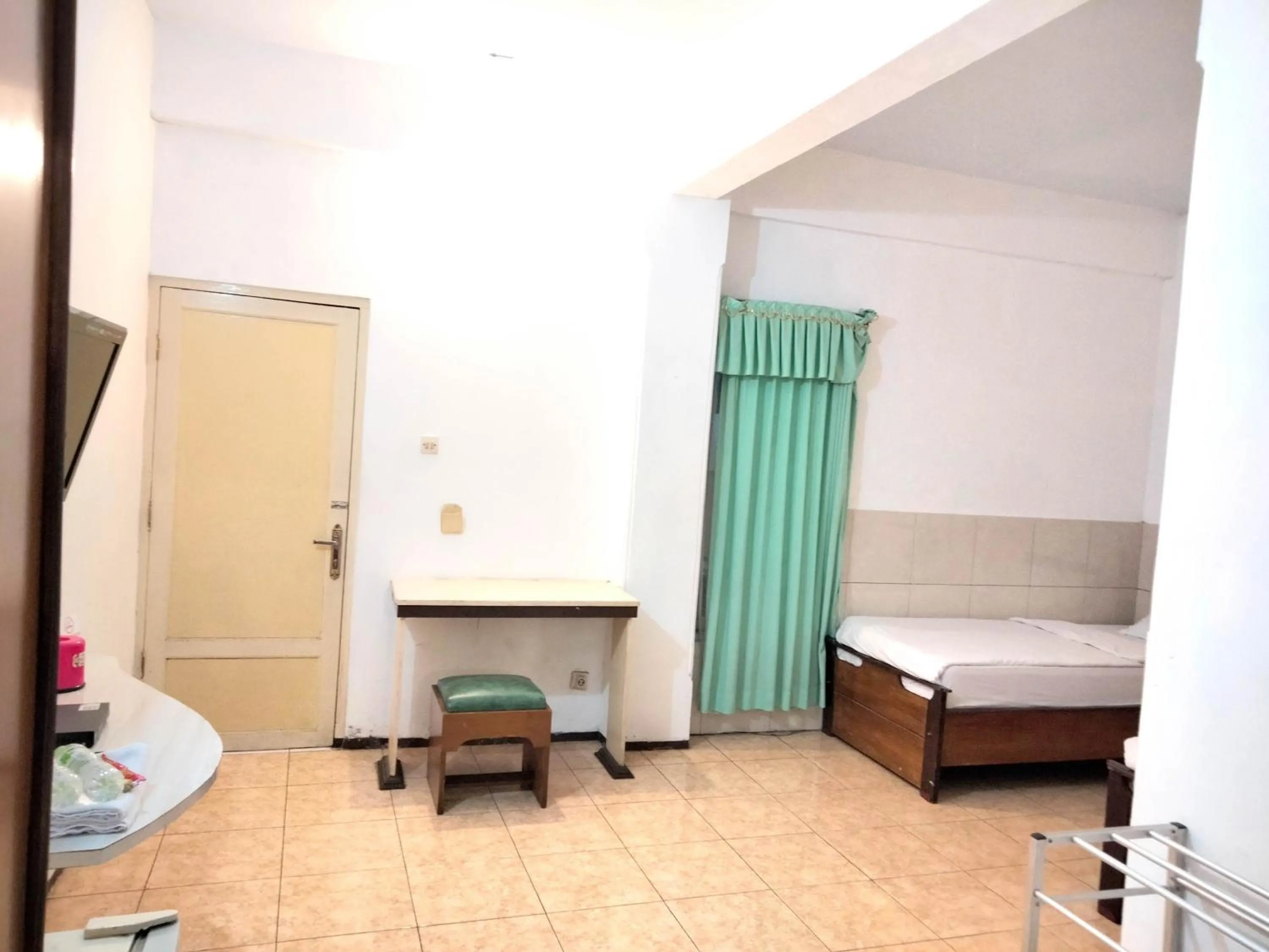 Bedroom, Bed in Sartika Hotel Mitra RedDoorz Pati