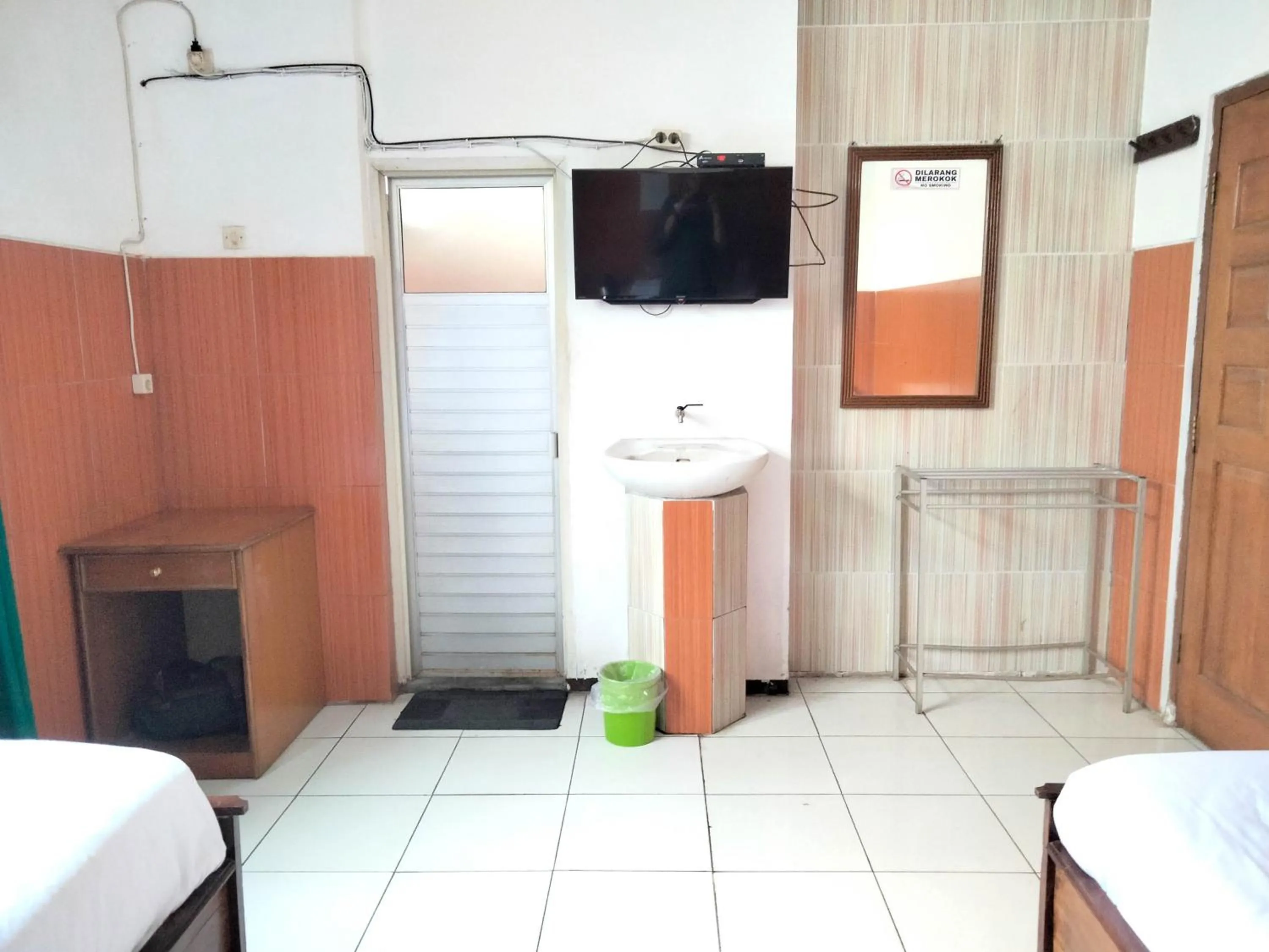 Bedroom in Sartika Hotel Mitra RedDoorz Pati