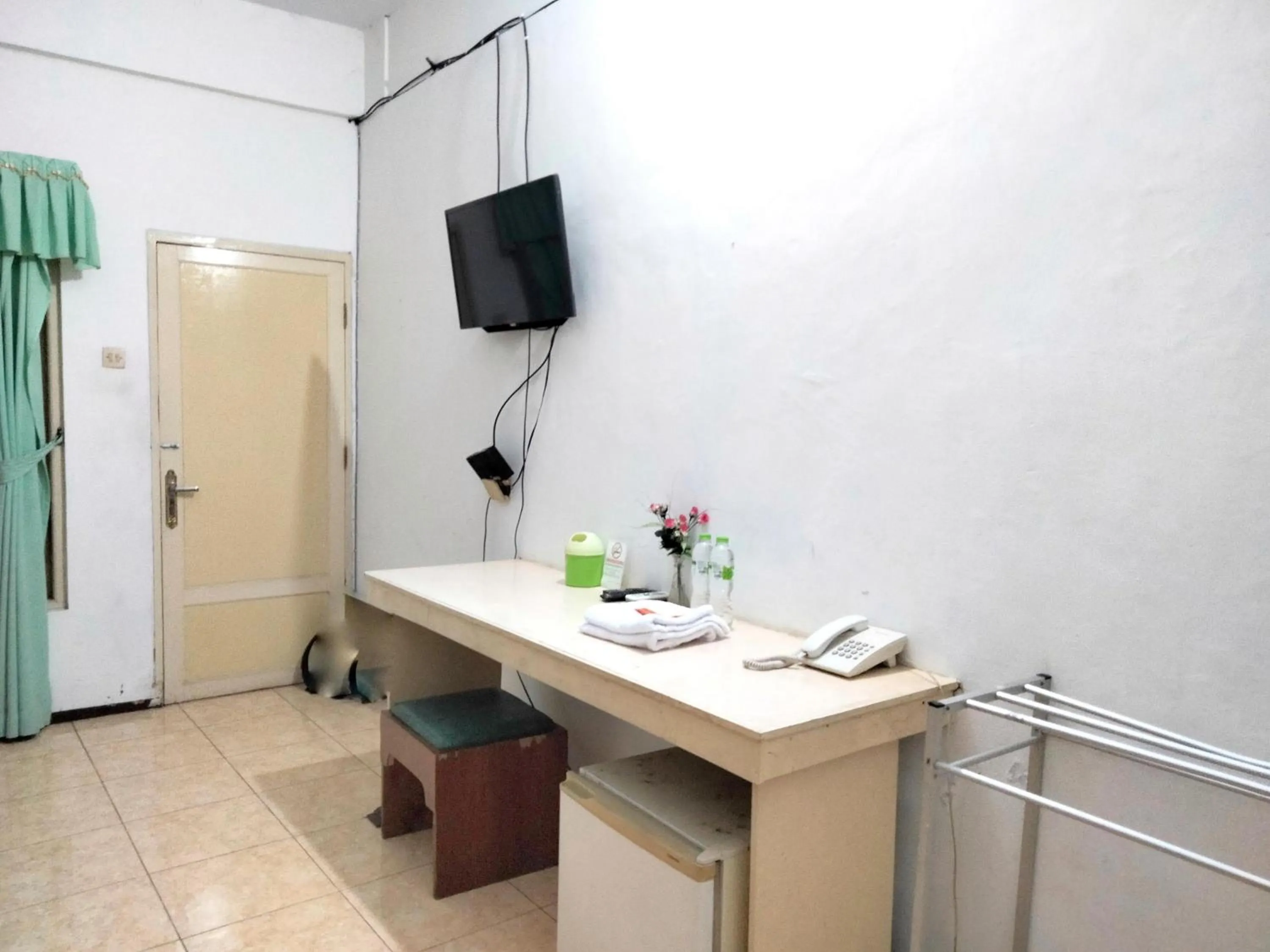 Bedroom in Sartika Hotel Mitra RedDoorz Pati