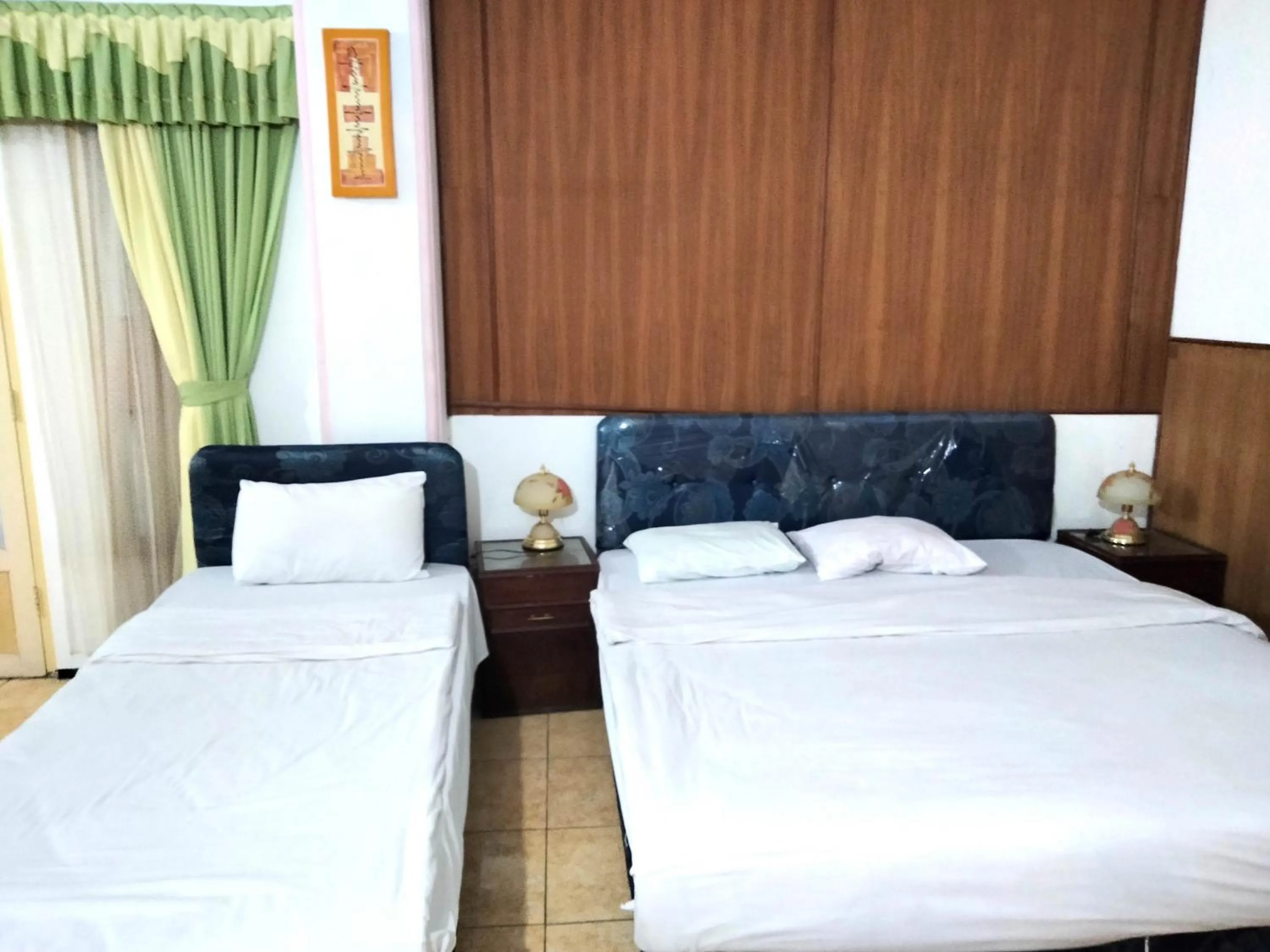 Bedroom, Bed in Sartika Hotel Mitra RedDoorz Pati