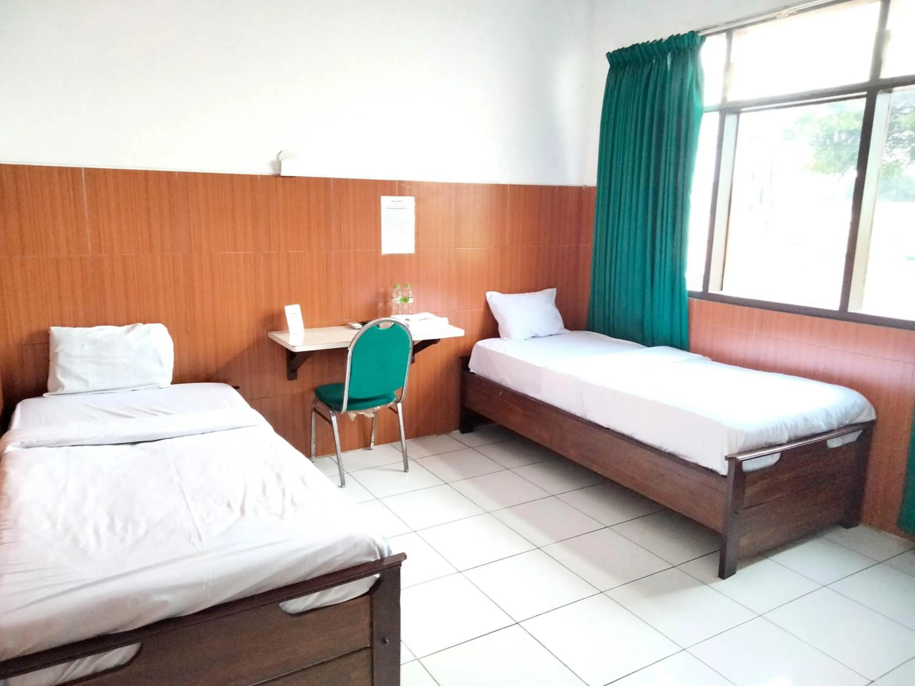 Bedroom, Bed in Sartika Hotel Mitra RedDoorz Pati