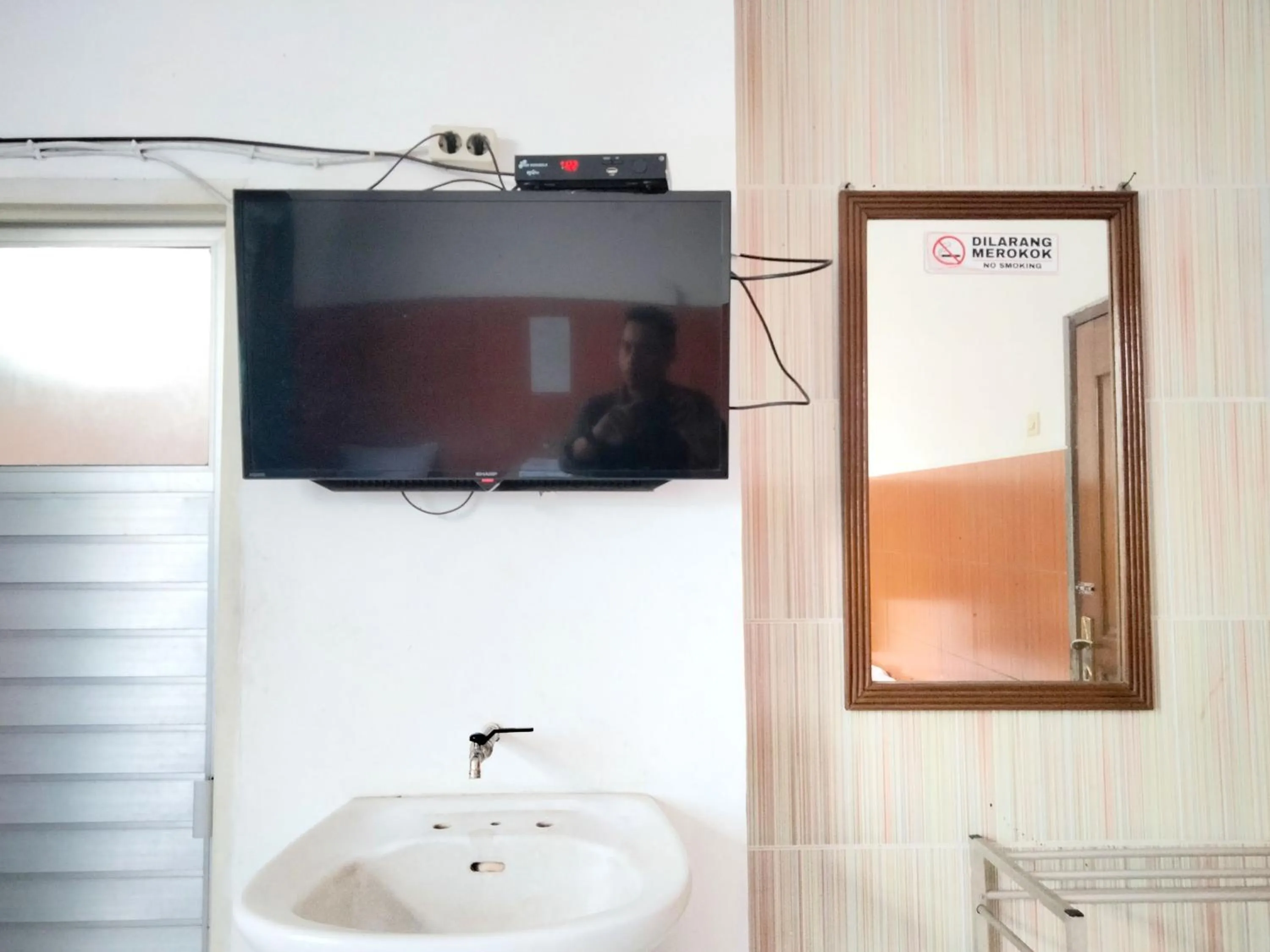 Bedroom in Sartika Hotel Mitra RedDoorz Pati