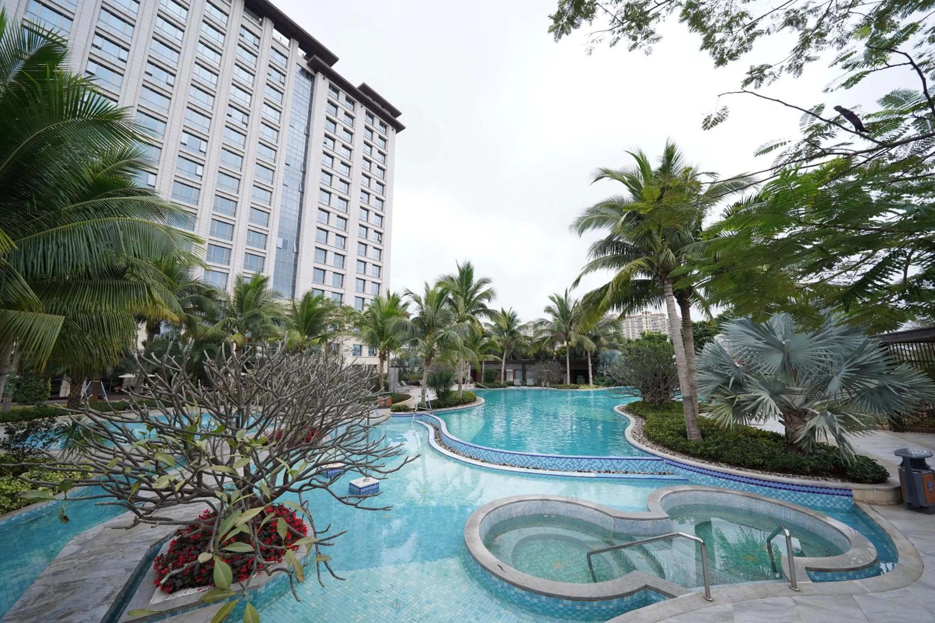 Swimming pool in Vignette Collection Haikou Yatter Hotel by IHG