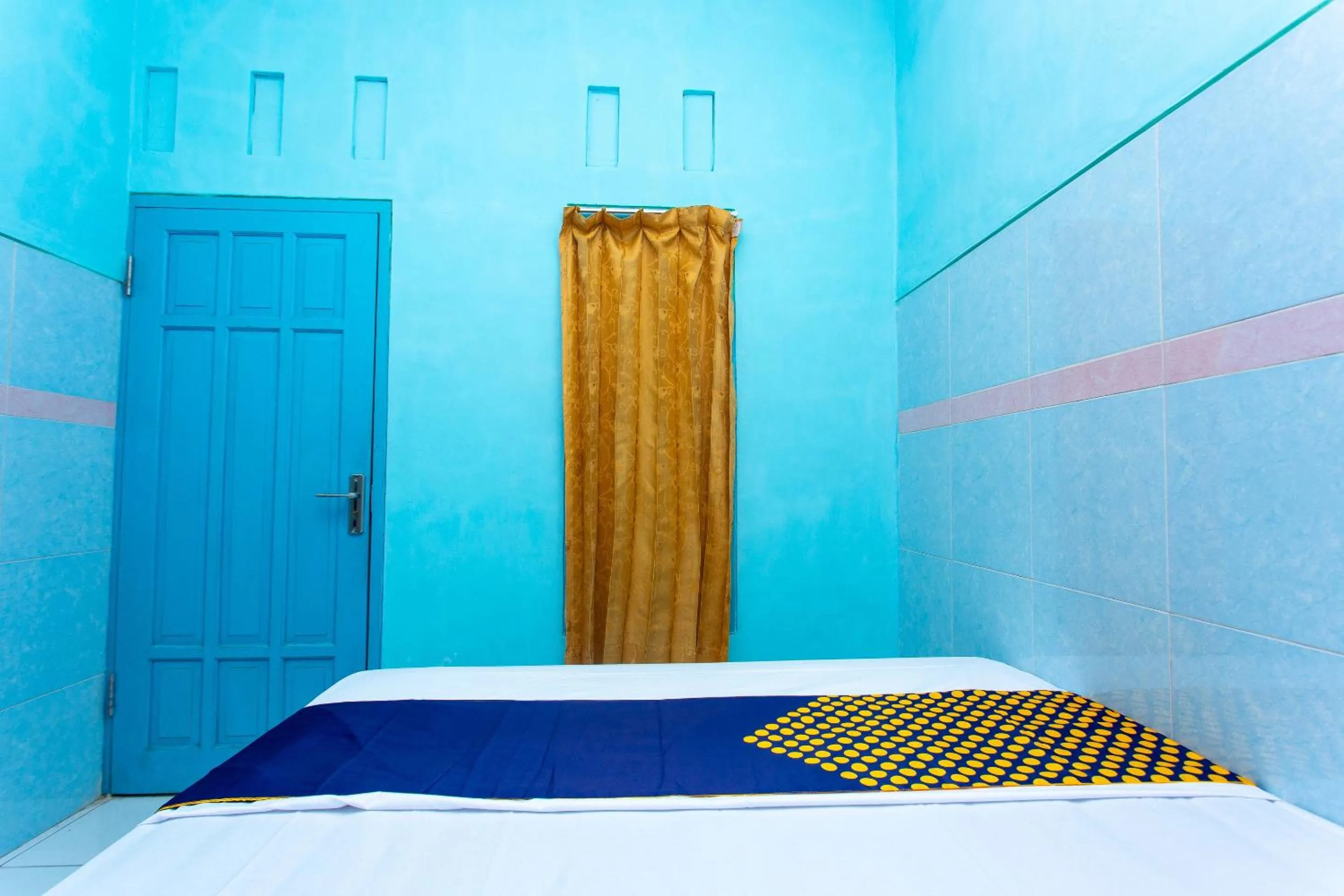 Bedroom in Hotel O Budi