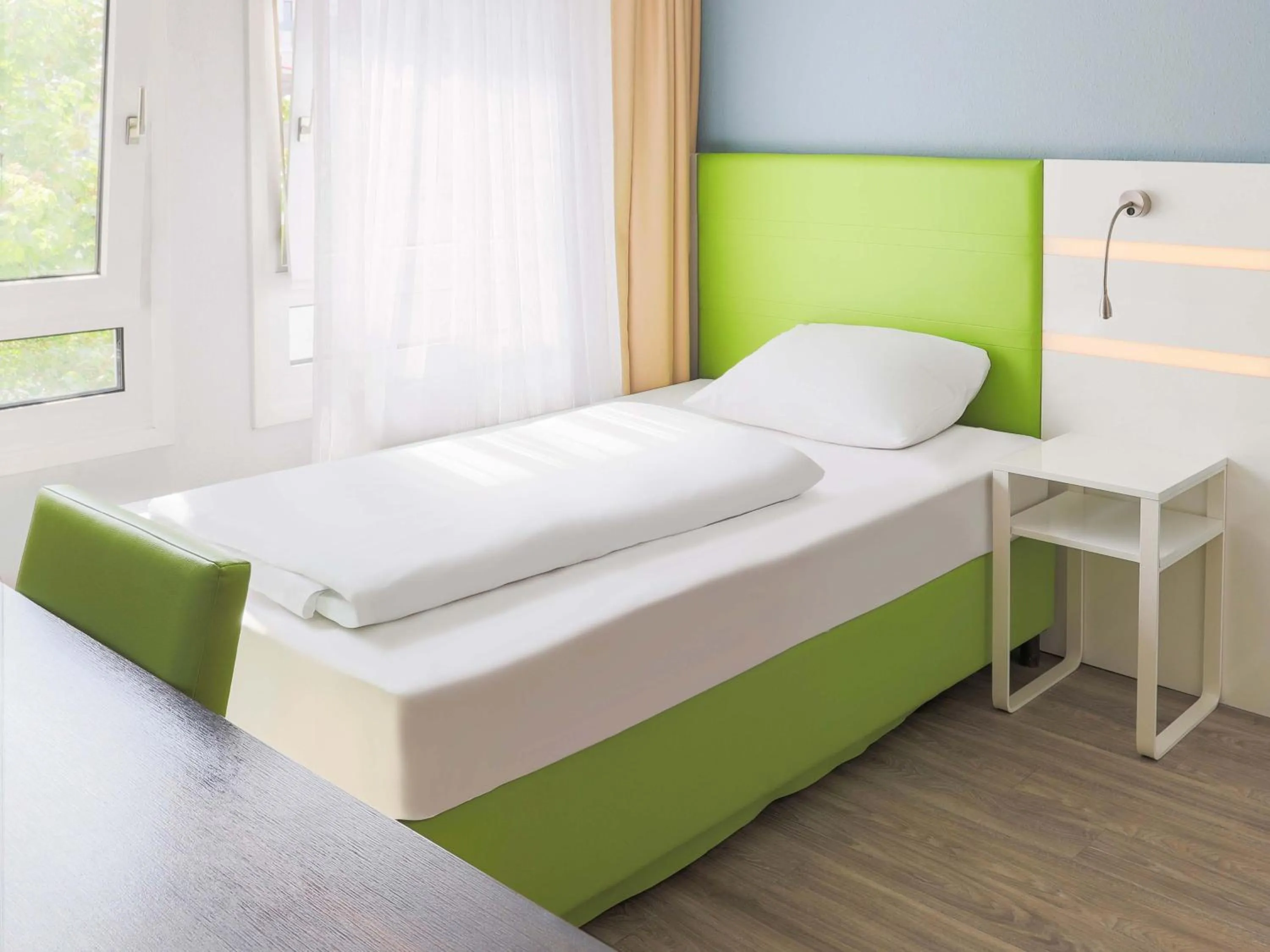 Photo of the whole room, Bed in B&B HOTEL Mannheim-City