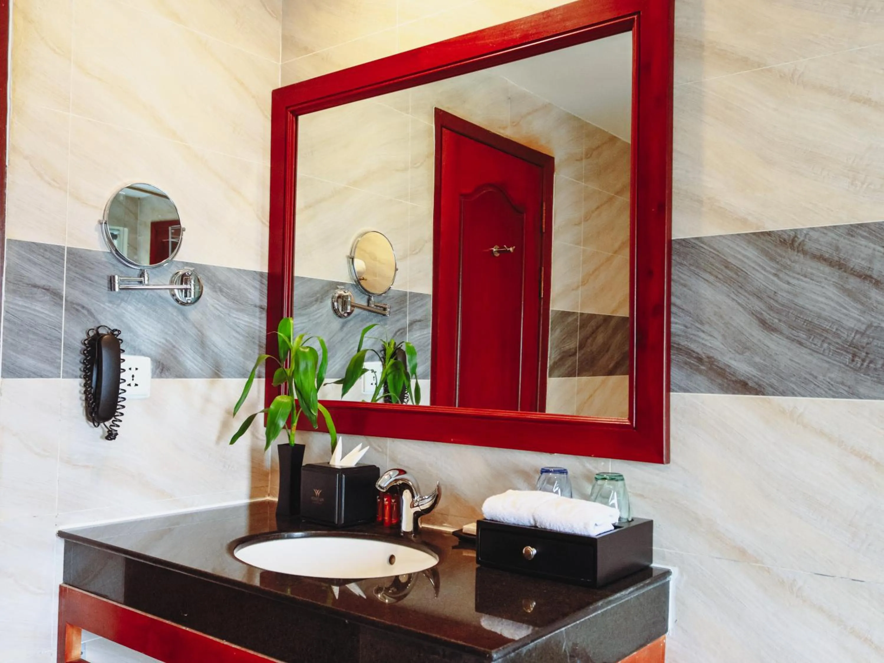 Bathroom in Poulo Wai Hotel, Trademark Collection by Wyndham