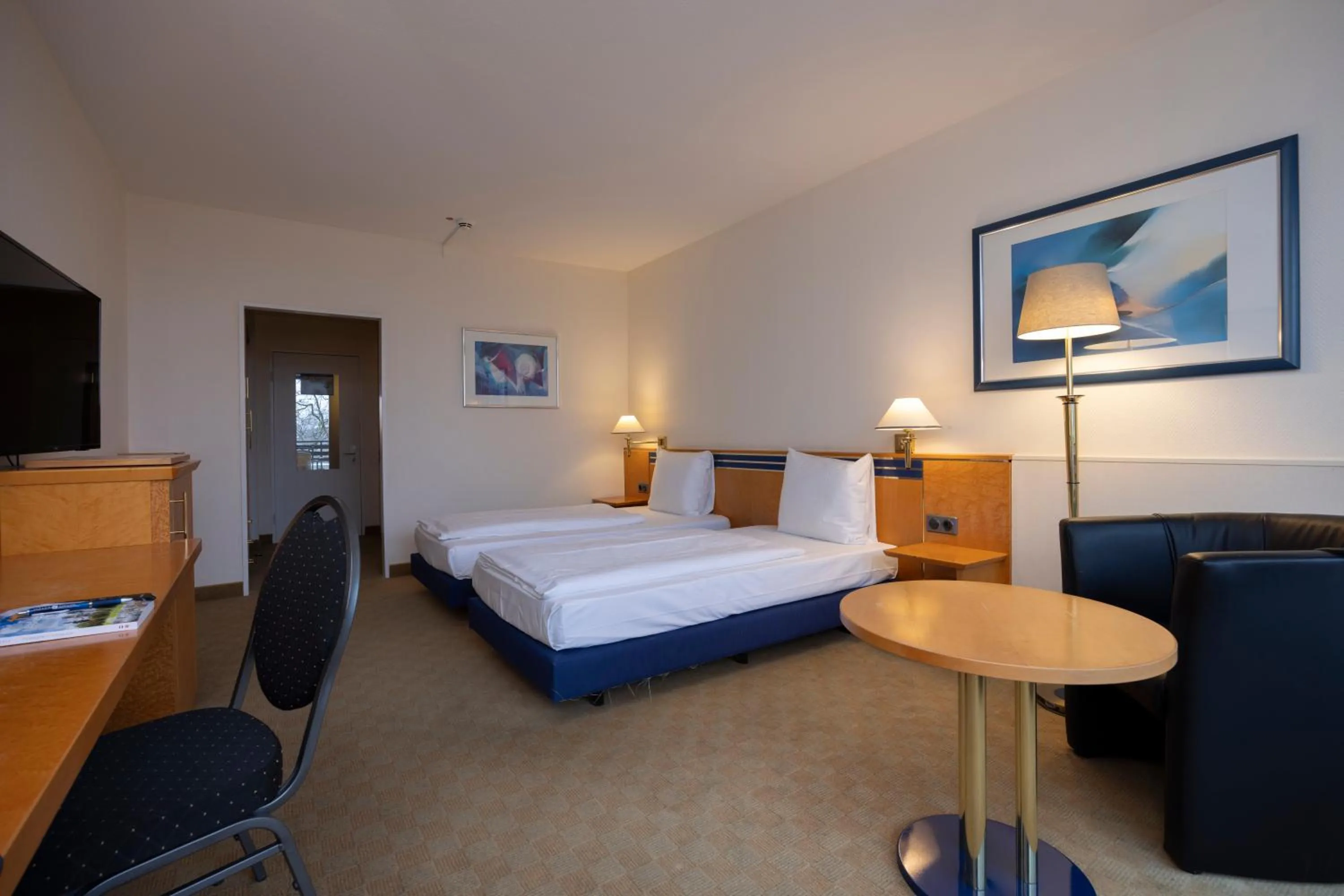 Photo of the whole room, Bed in Fletcher Hotel-Restaurant Arnsberg-Sauerland