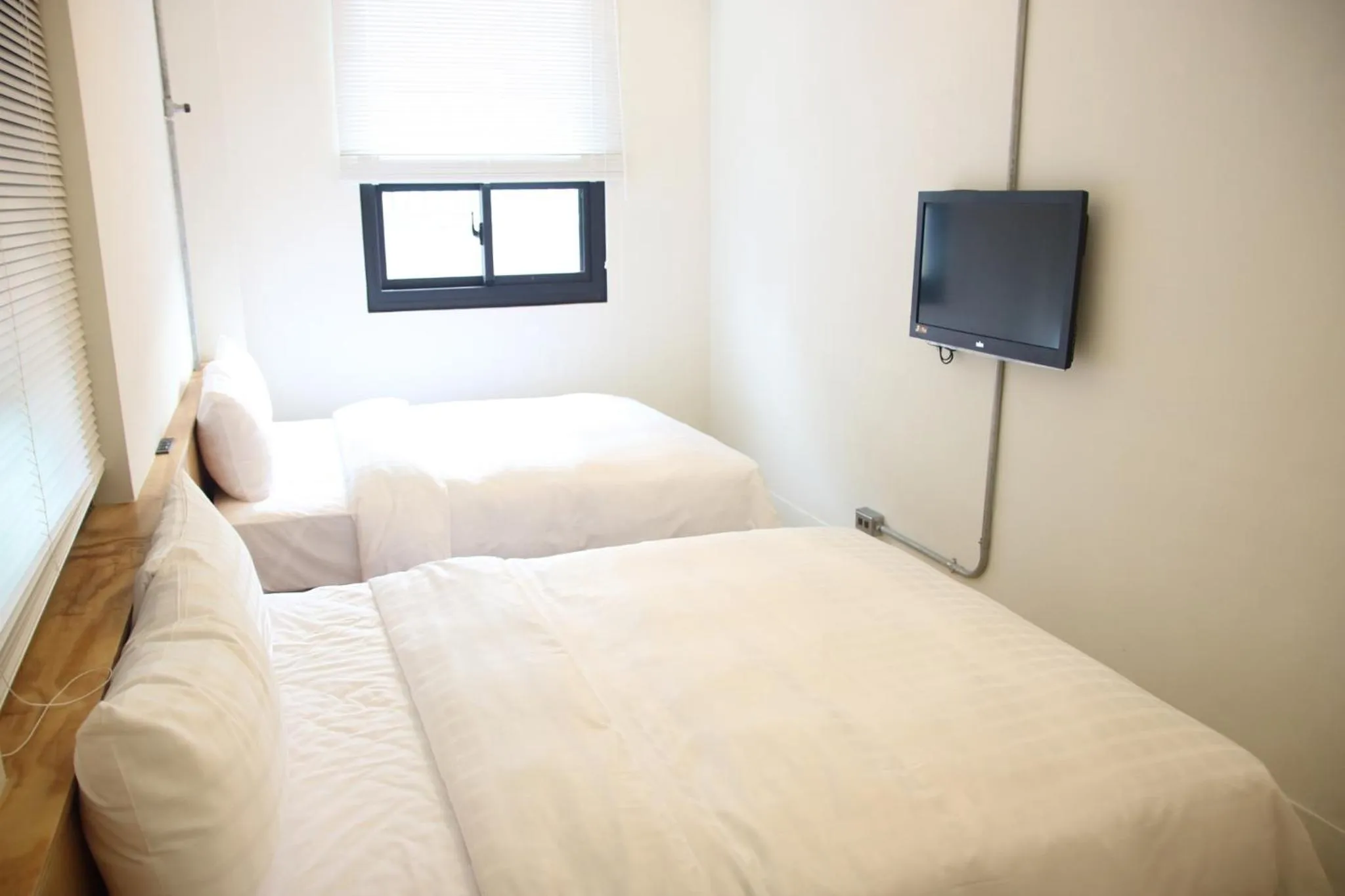 Bed in Home Rest Hotel 2