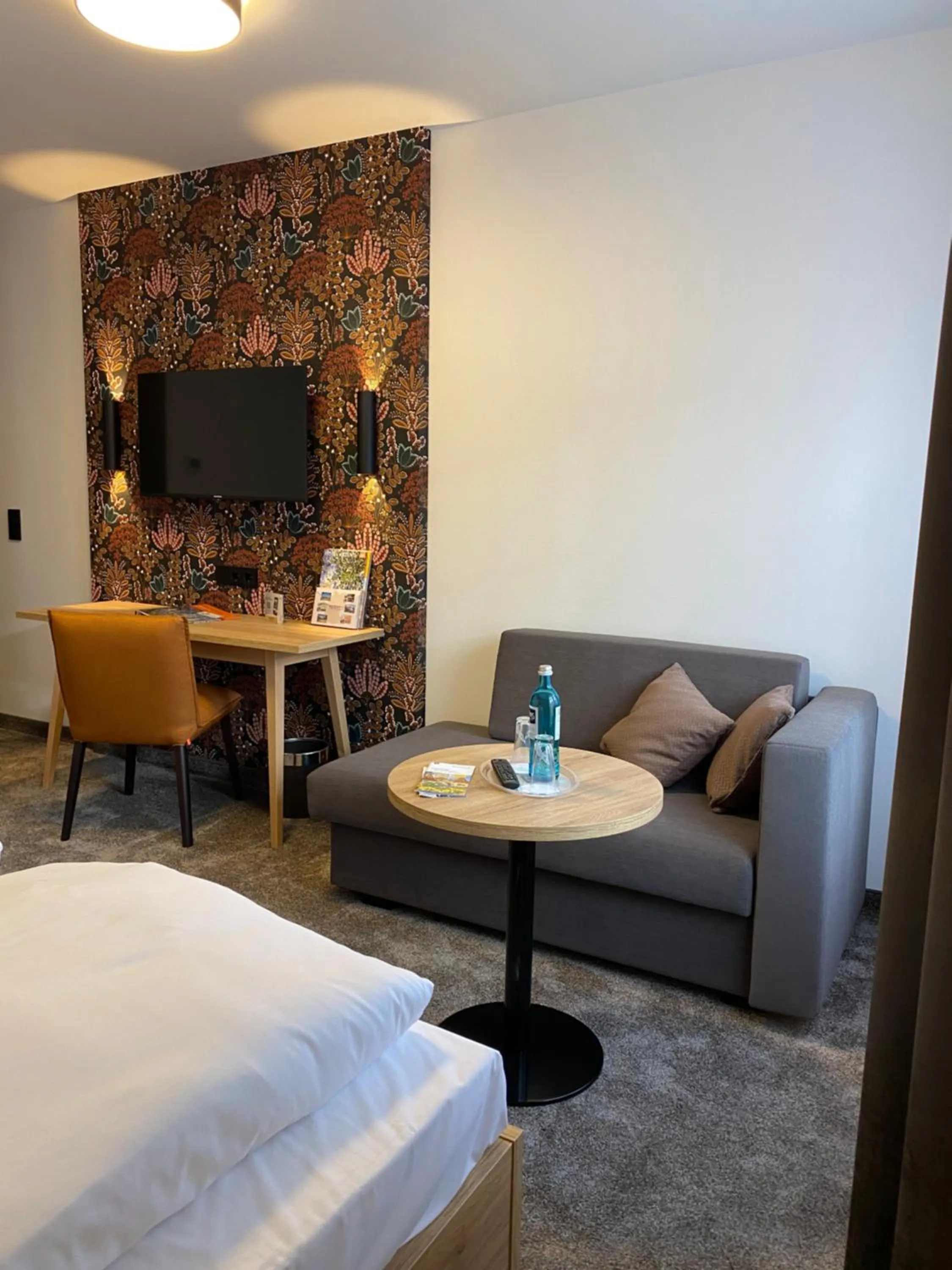 Seating area, Bed in Akzent Hotel Schranne