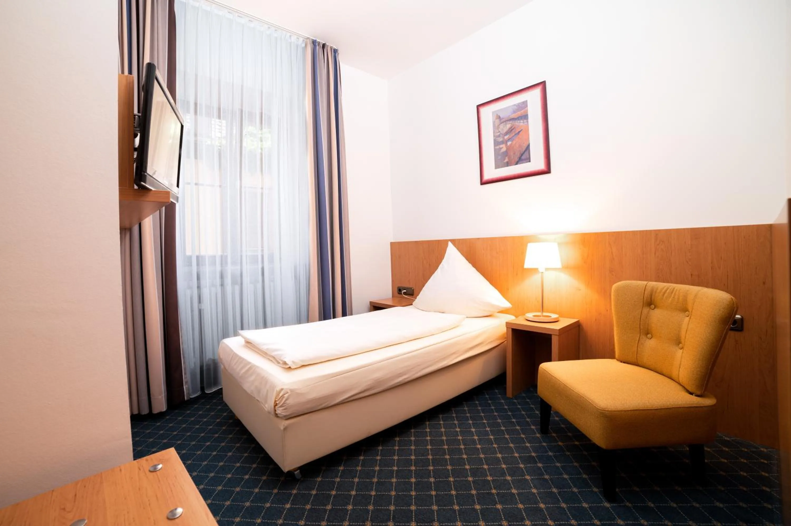 Photo of the whole room, Bed in Akzent Hotel Schranne