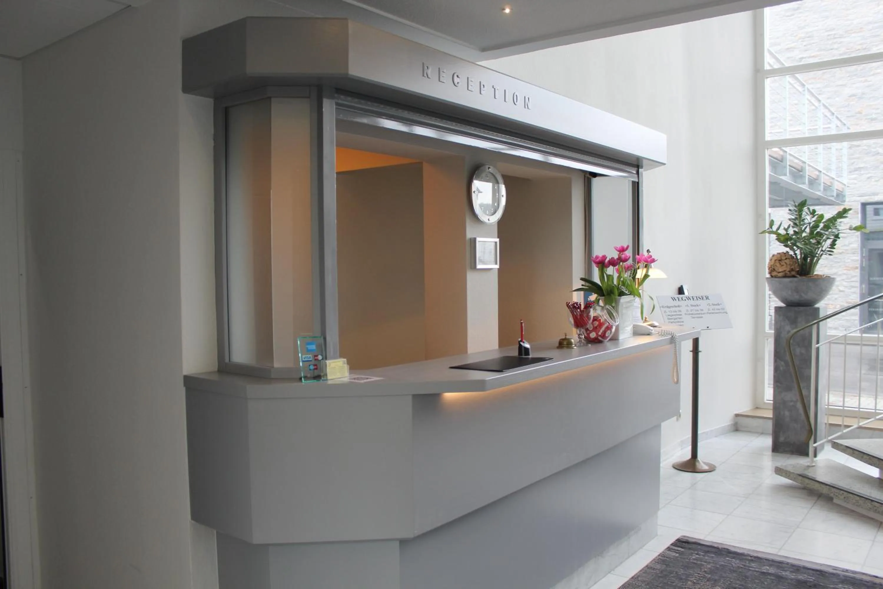 Lobby or reception in Stadthotel Geis