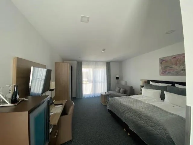 Photo of the whole room, Bed in Stadthotel Geis