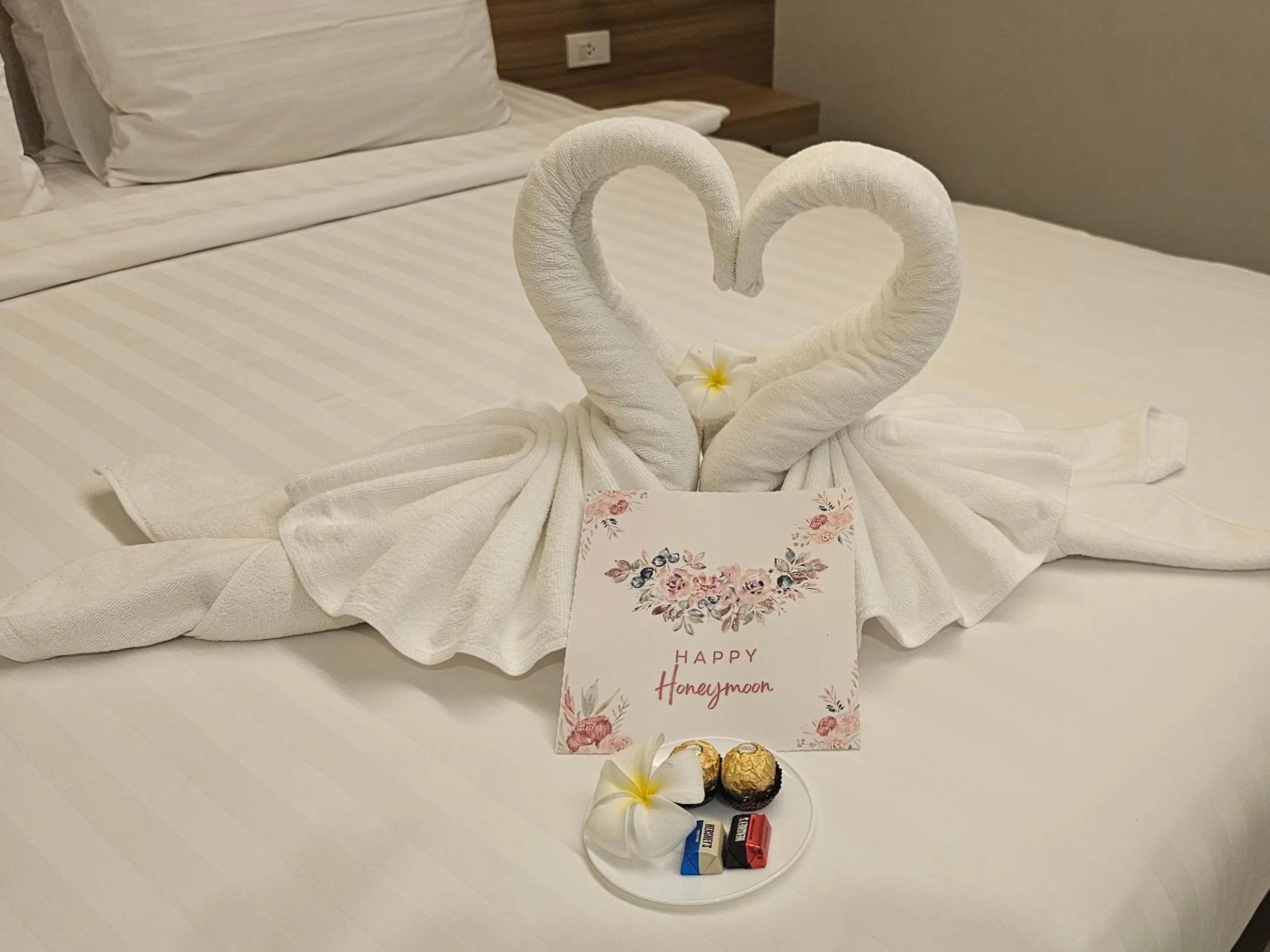 Bed in ARENICE Boutique Hotel