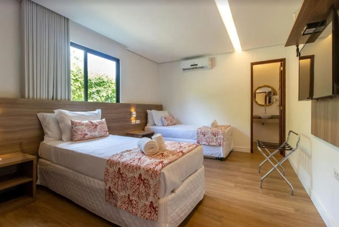 Bed in Pousada Morro do Farol