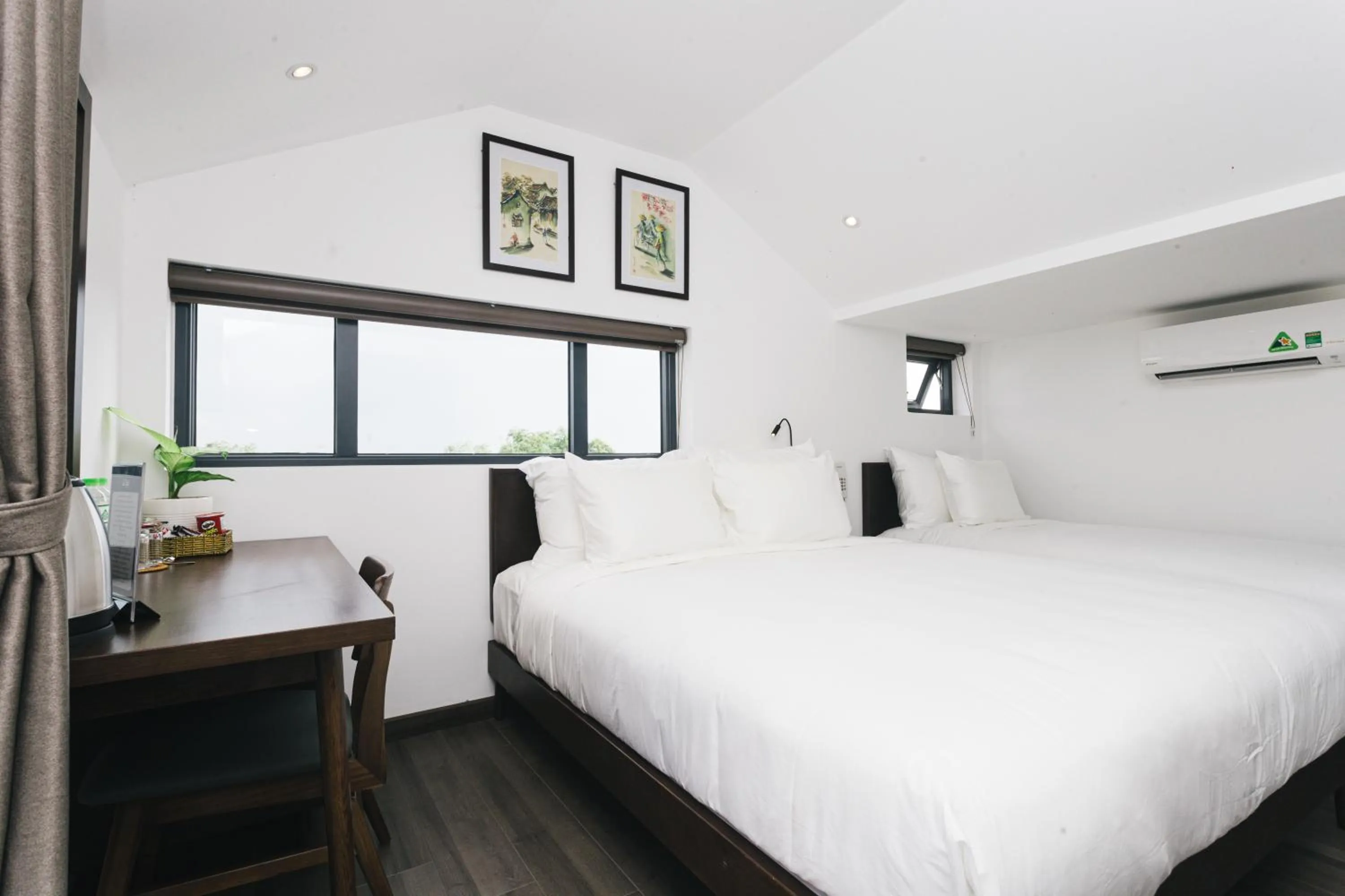 Bed in Le Petit Villa Hoi An