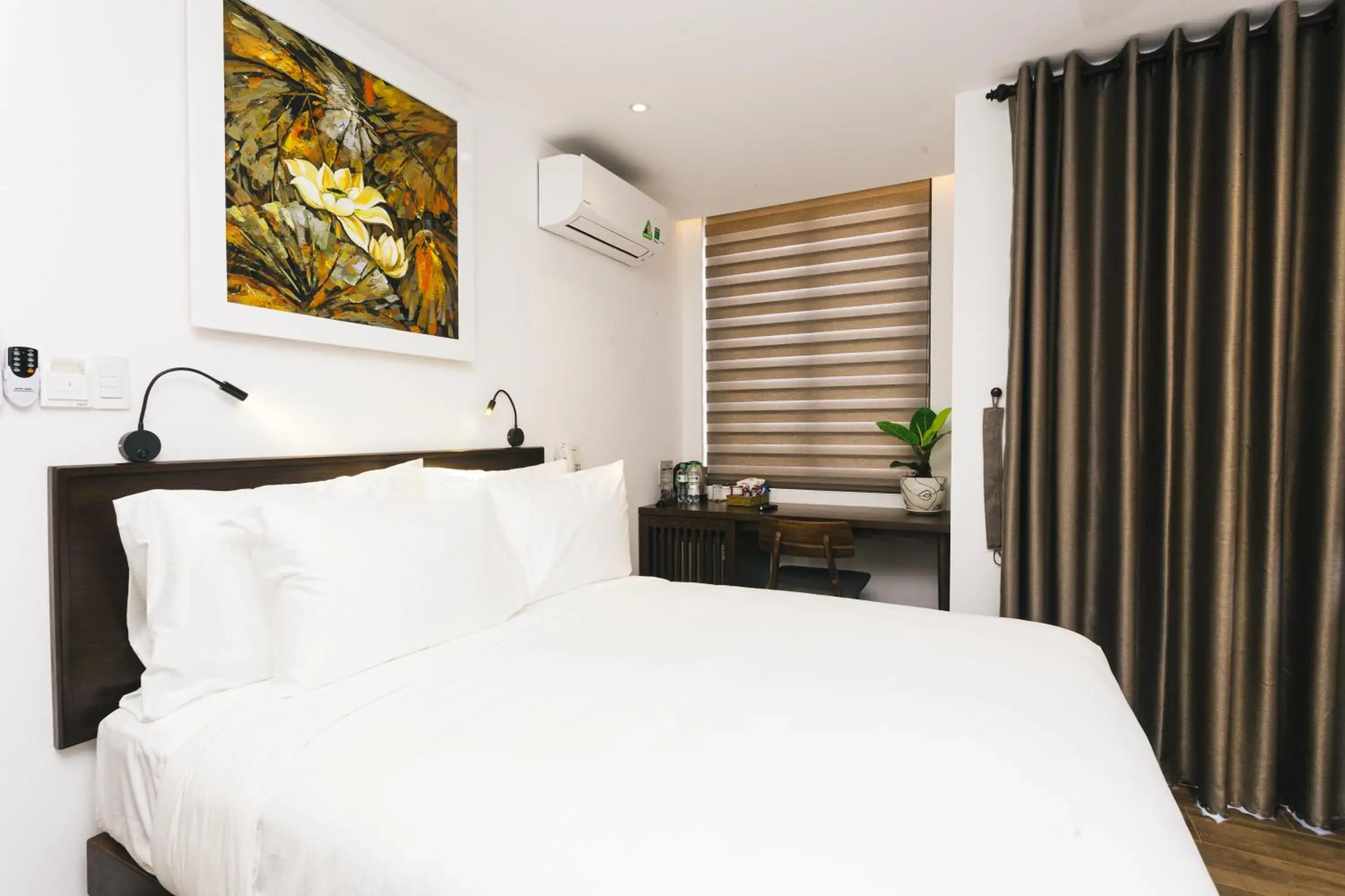 Deluxe Double Room with Balcony in Le Petit Villa Hoi An Deluxe Double Room with Balcony in Le Petit Villa Hoi An