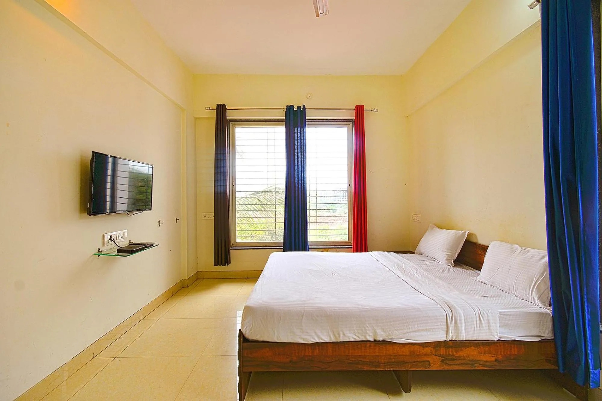 Bed in FabExpress Golden Leaf Airport