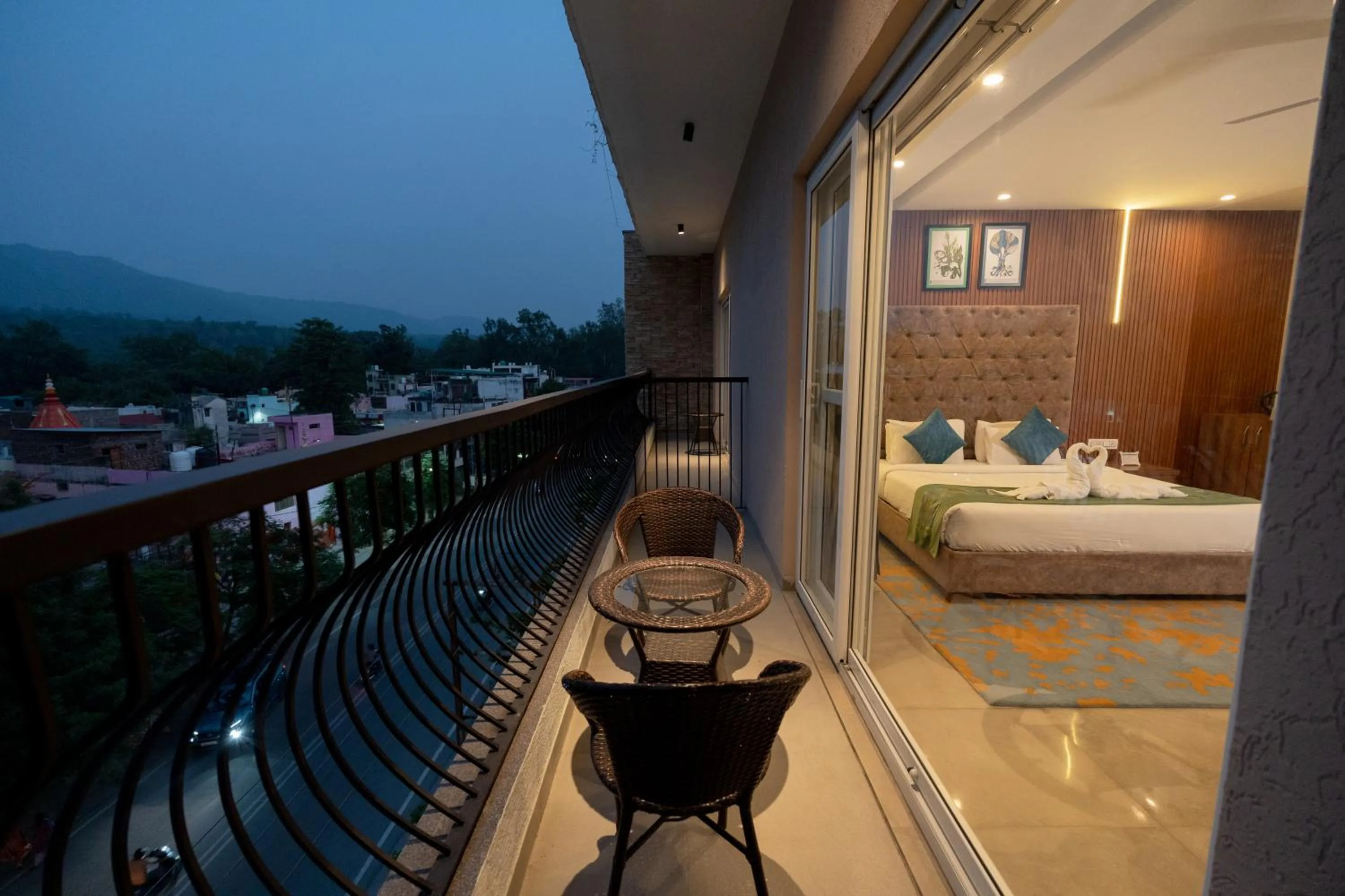 Balcony/Terrace, Bed in HOLYWATER Hotel by Ganga Kinare #150 mts from Ganga Ghat Rishikesh