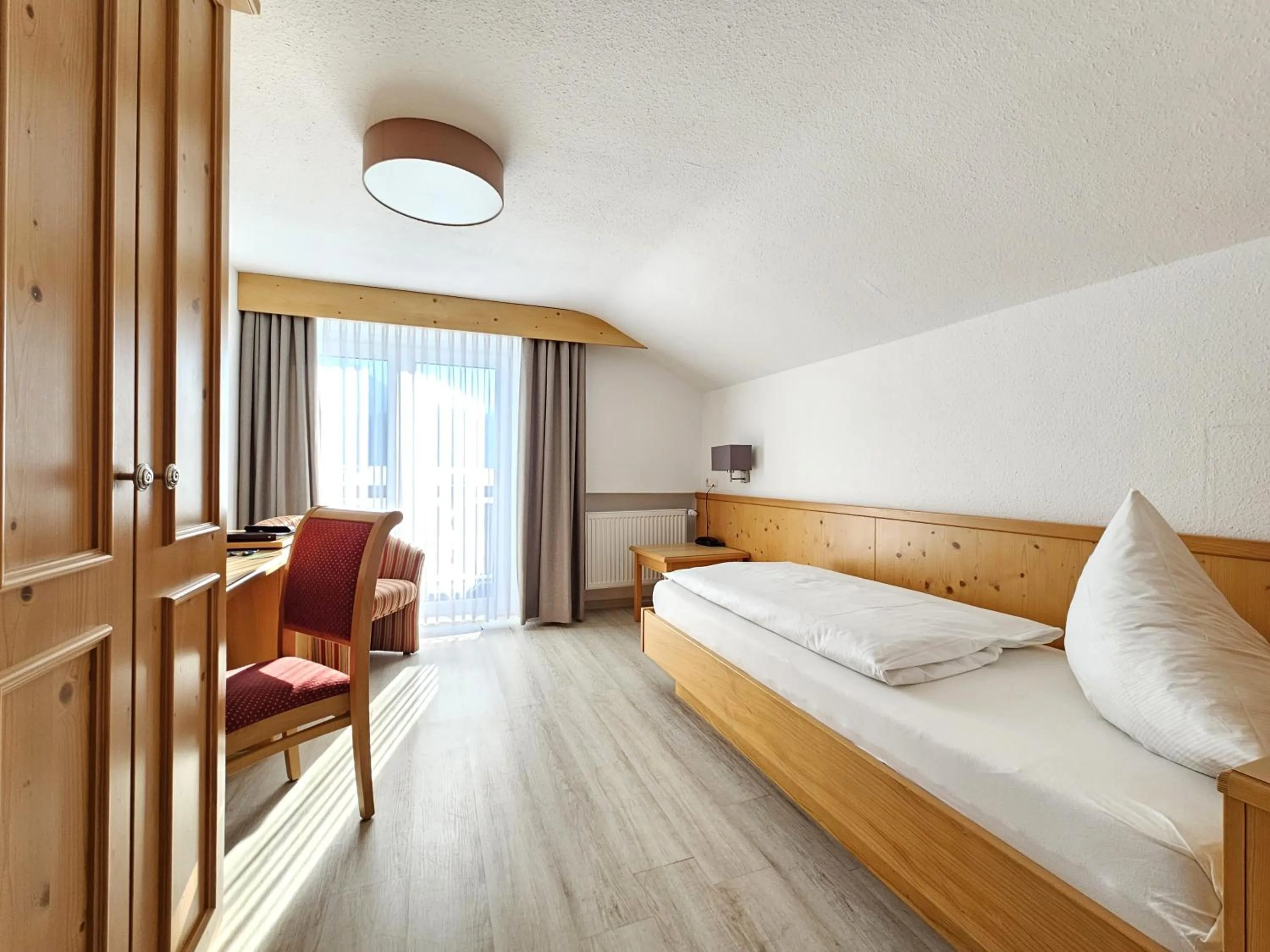 Photo of the whole room, Bed in Hotel Cafe Fuggerhof