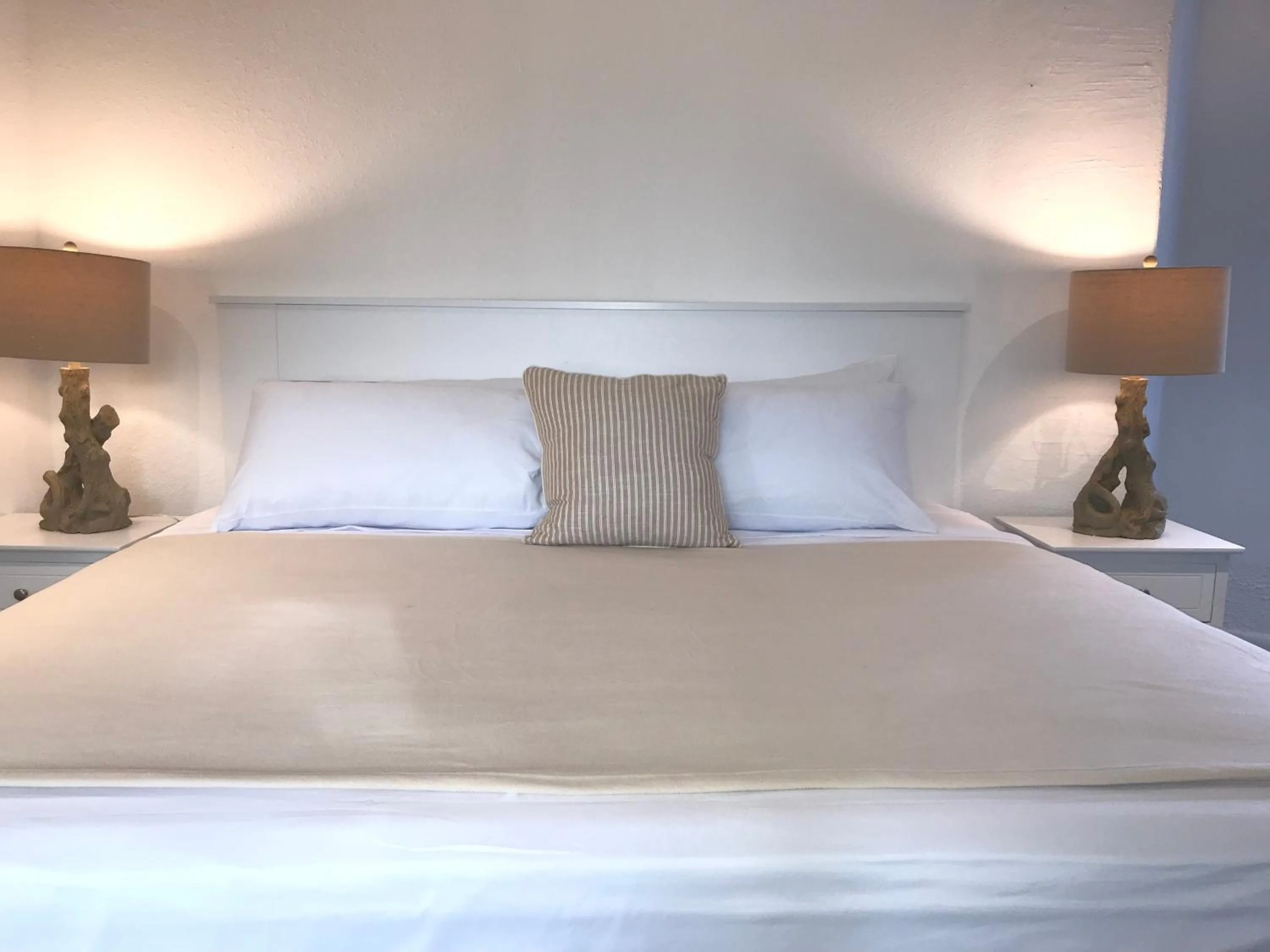 Bed in The Sunset Cove and Rainbow Room