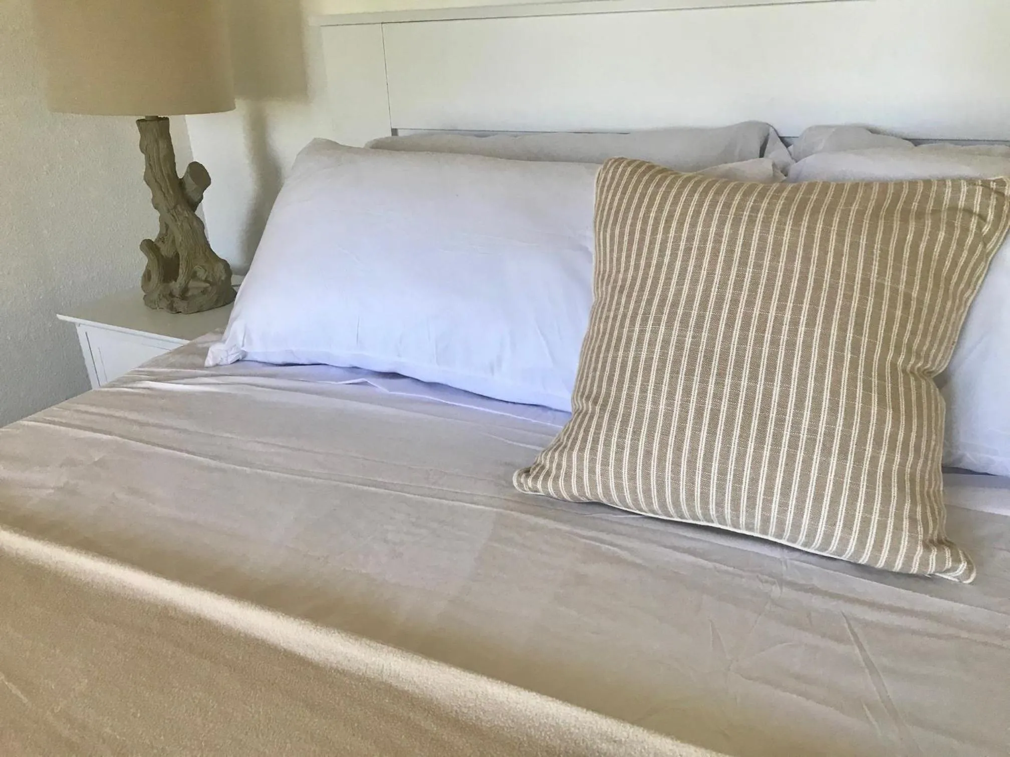 Bed in The Sunset Cove and Rainbow Room